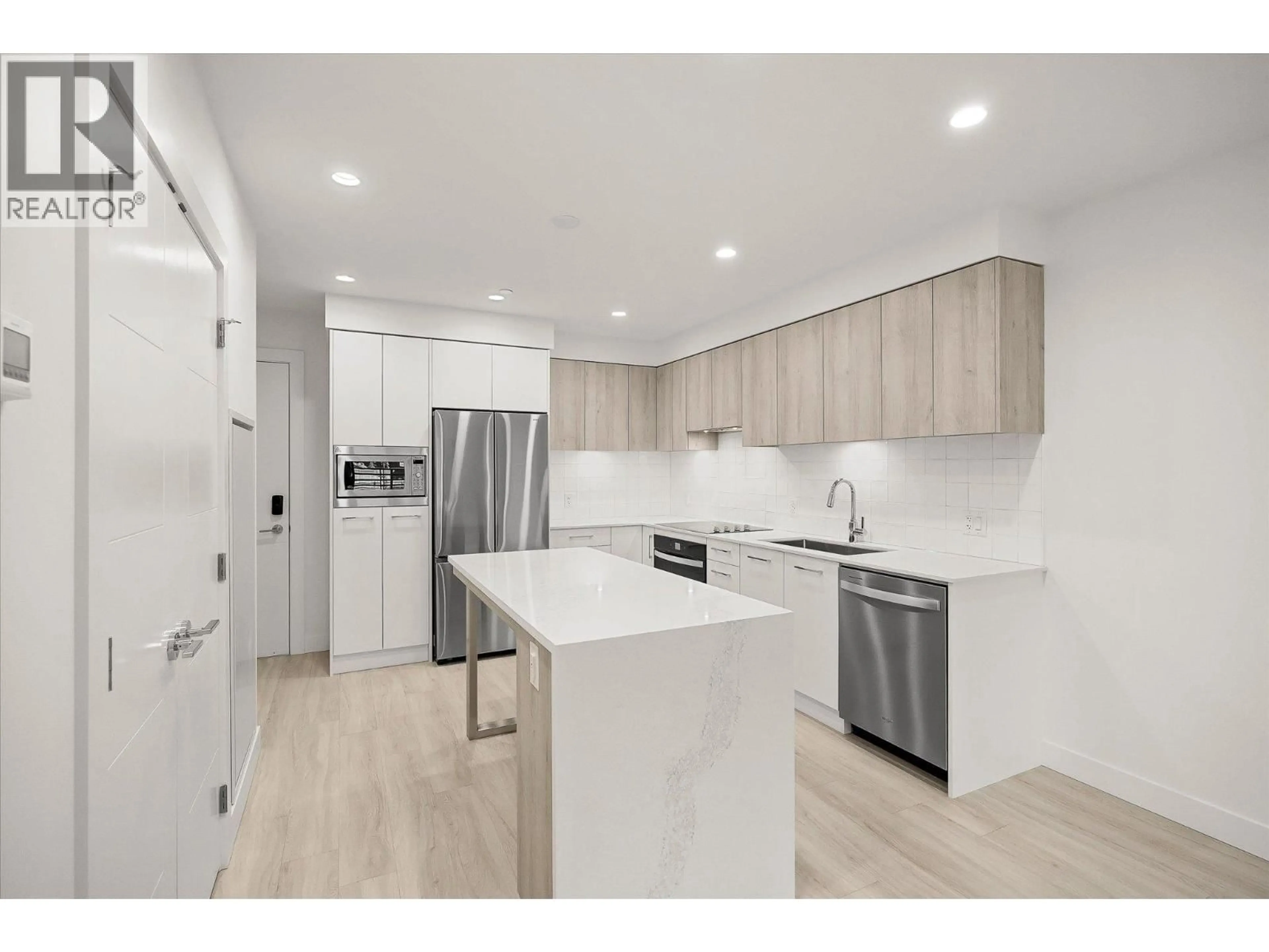 Open concept kitchen, unknown for 108 - 3699 CAPOZZI ROAD, Kelowna British Columbia V1W0G3