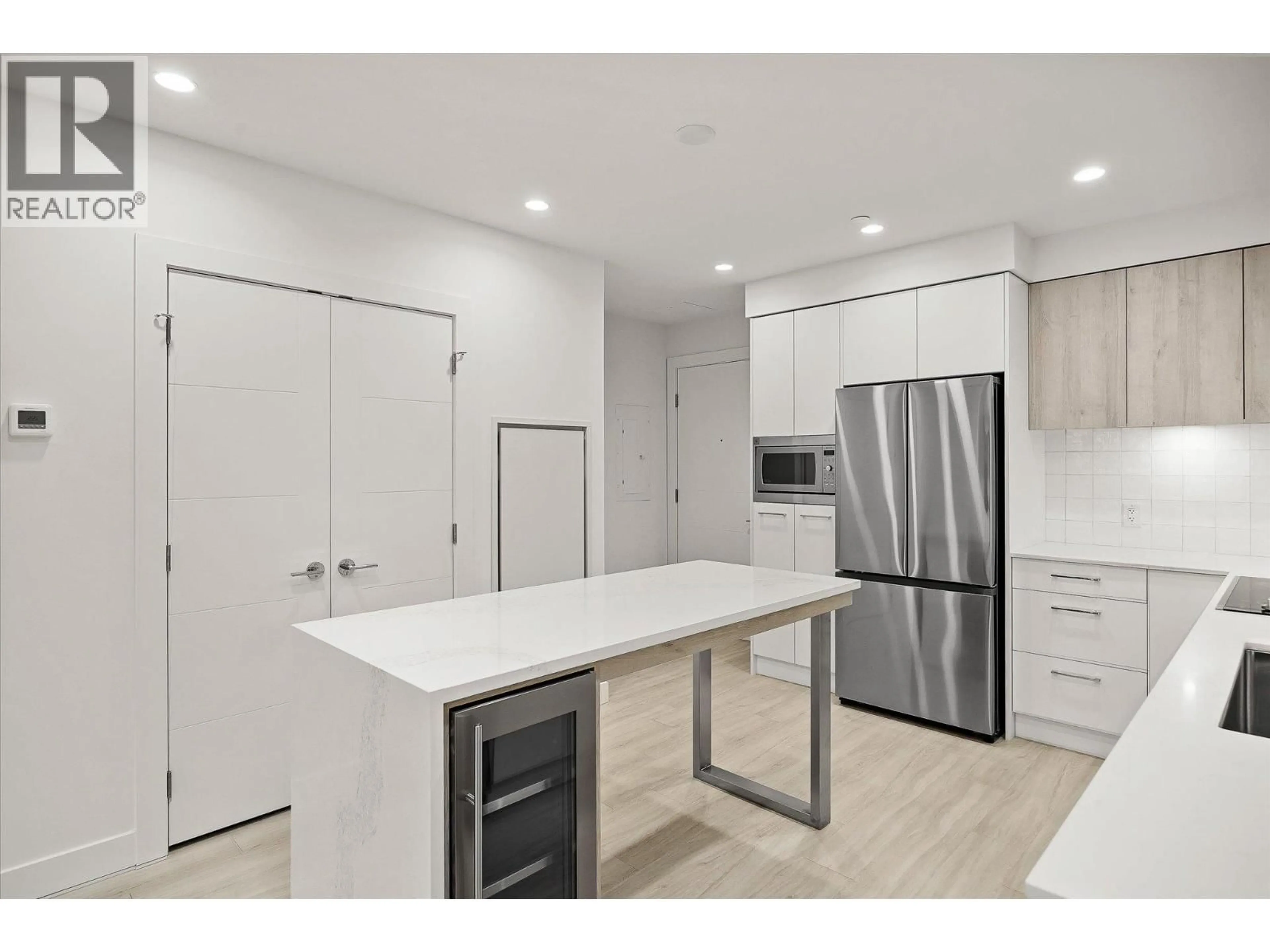 Open concept kitchen, unknown for 108 - 3699 CAPOZZI ROAD, Kelowna British Columbia V1W0G3