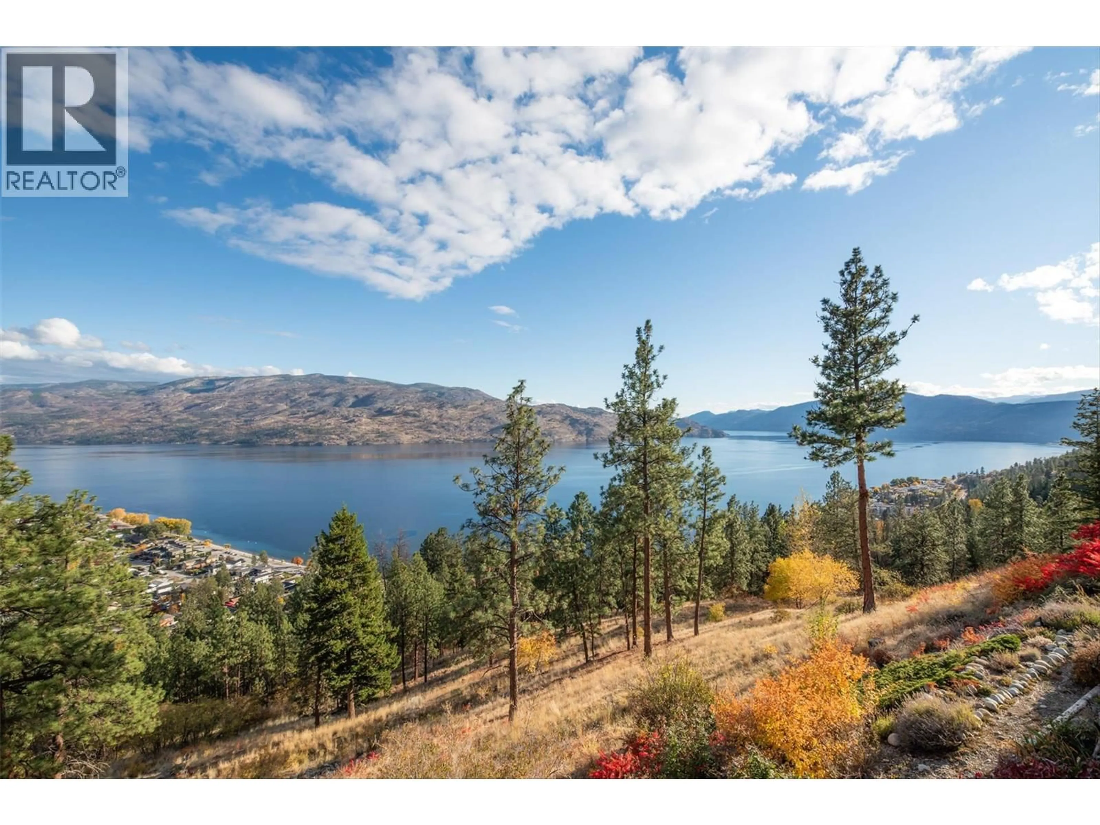 A pic from outside/outdoor area/front of a property/back of a property/a pic from drone, water/lake/river/ocean view for 103 - 4470 PONDEROSA DRIVE, Peachland British Columbia V0H1X5