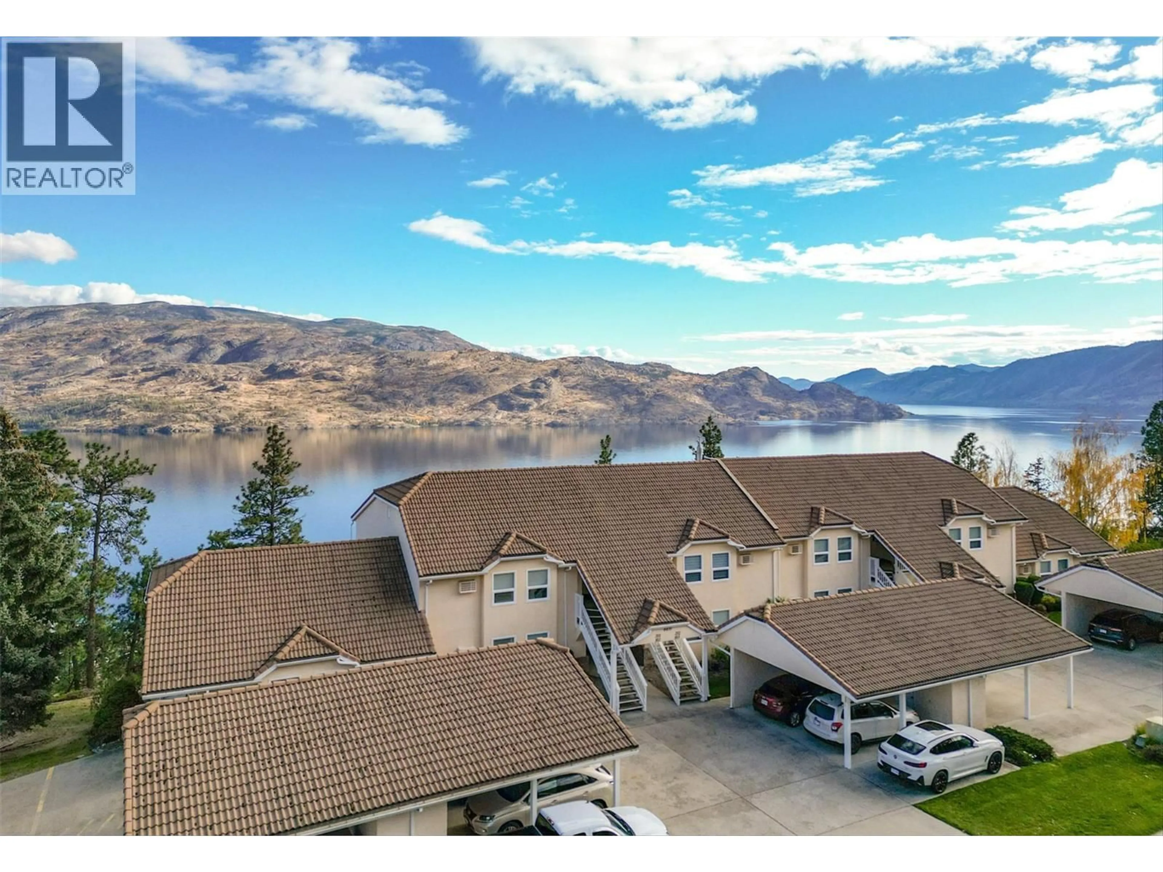 A pic from outside/outdoor area/front of a property/back of a property/a pic from drone, water/lake/river/ocean view for 103 - 4470 PONDEROSA DRIVE, Peachland British Columbia V0H1X5