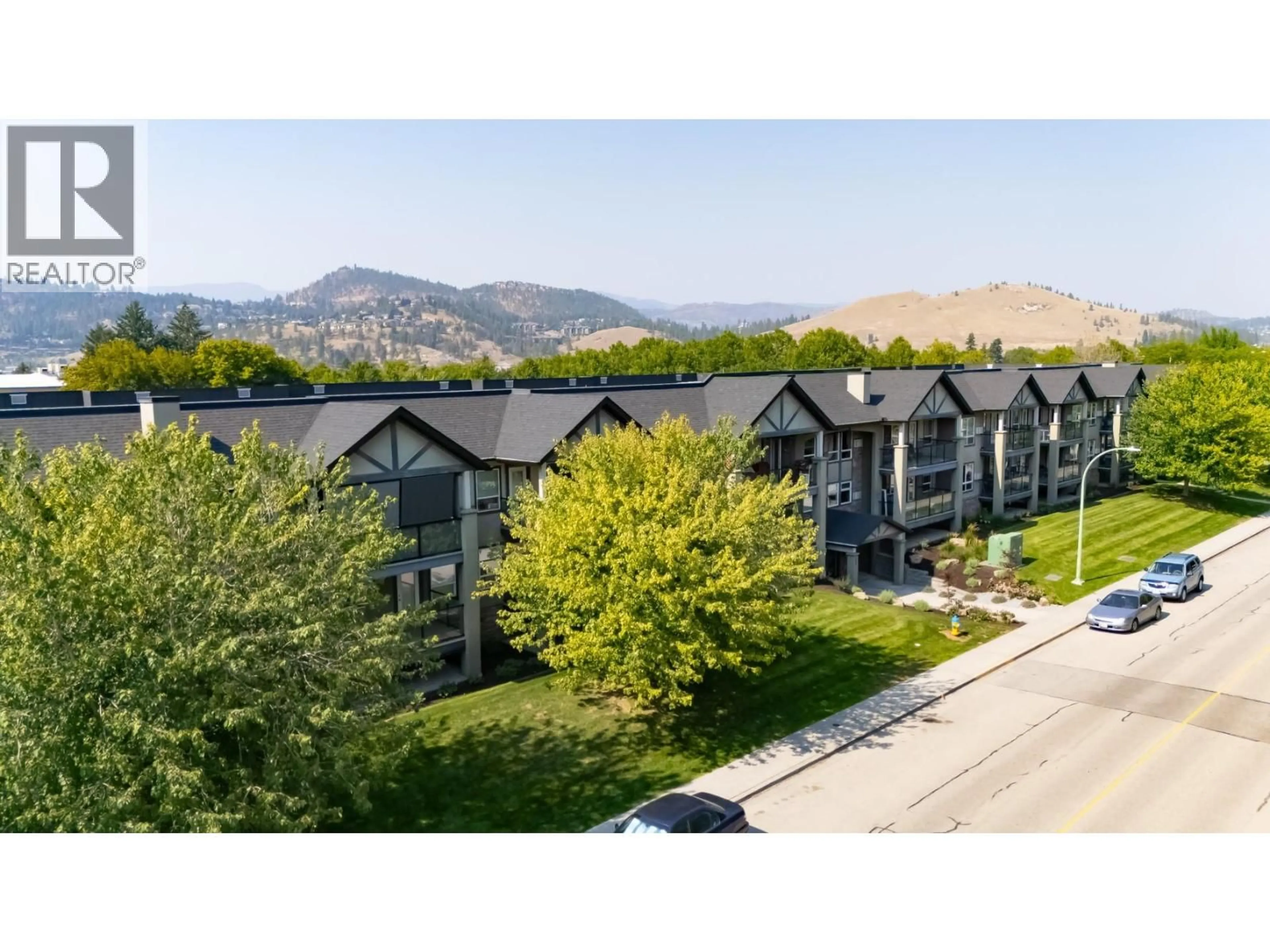 A pic from outside/outdoor area/front of a property/back of a property/a pic from drone, mountain view for 102 - 260 FRANKLYN ROAD, Kelowna British Columbia V1X8C1