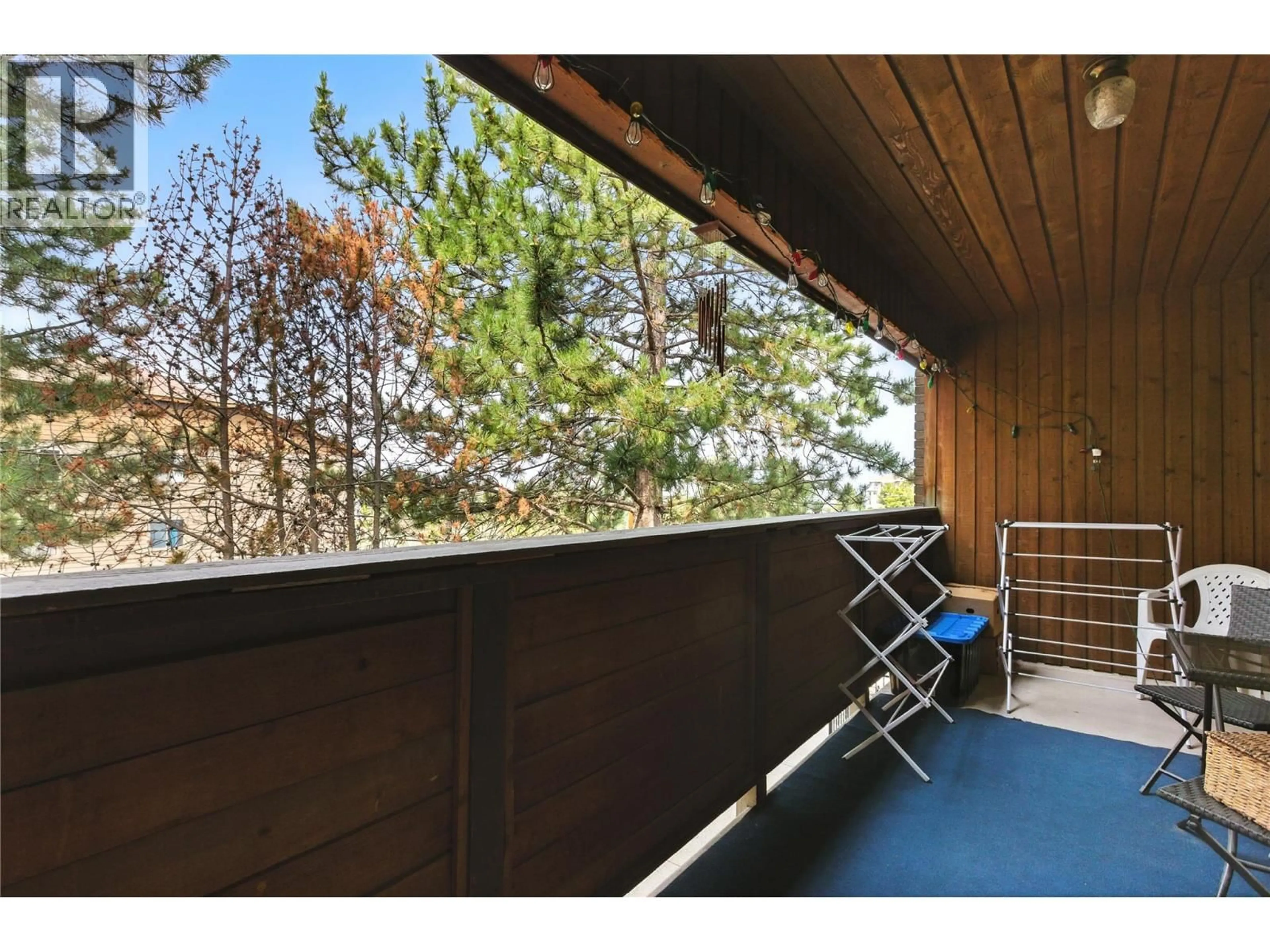 Balcony in the apartment, forest/trees view for 306 - 44 WHITESHIELD CRESCENT SOUTH, Kamloops British Columbia V2E2J1