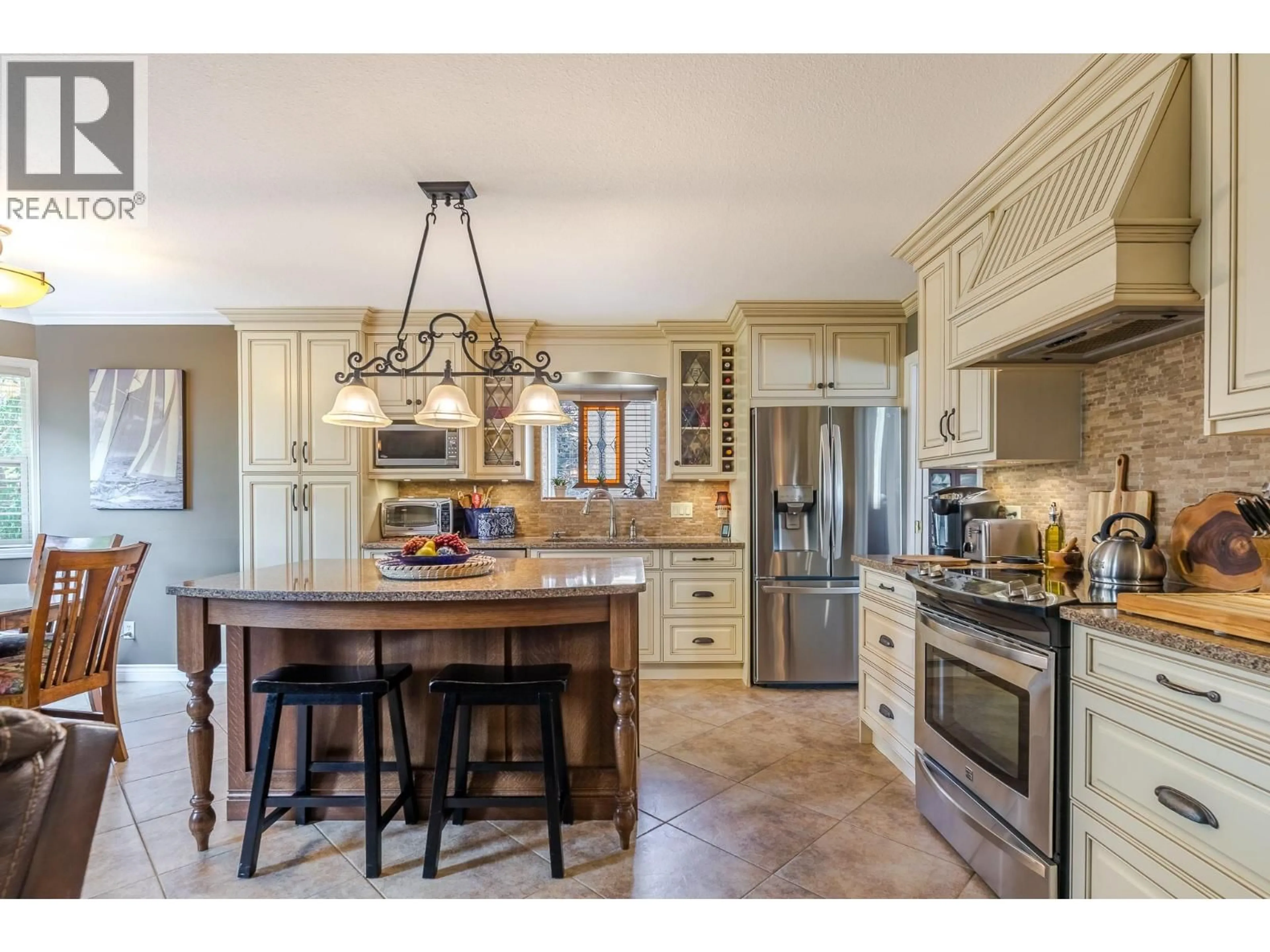 Open concept kitchen, ceramic/tile floor for 683 WILTSE BOULEVARD, Penticton British Columbia V2A8P5