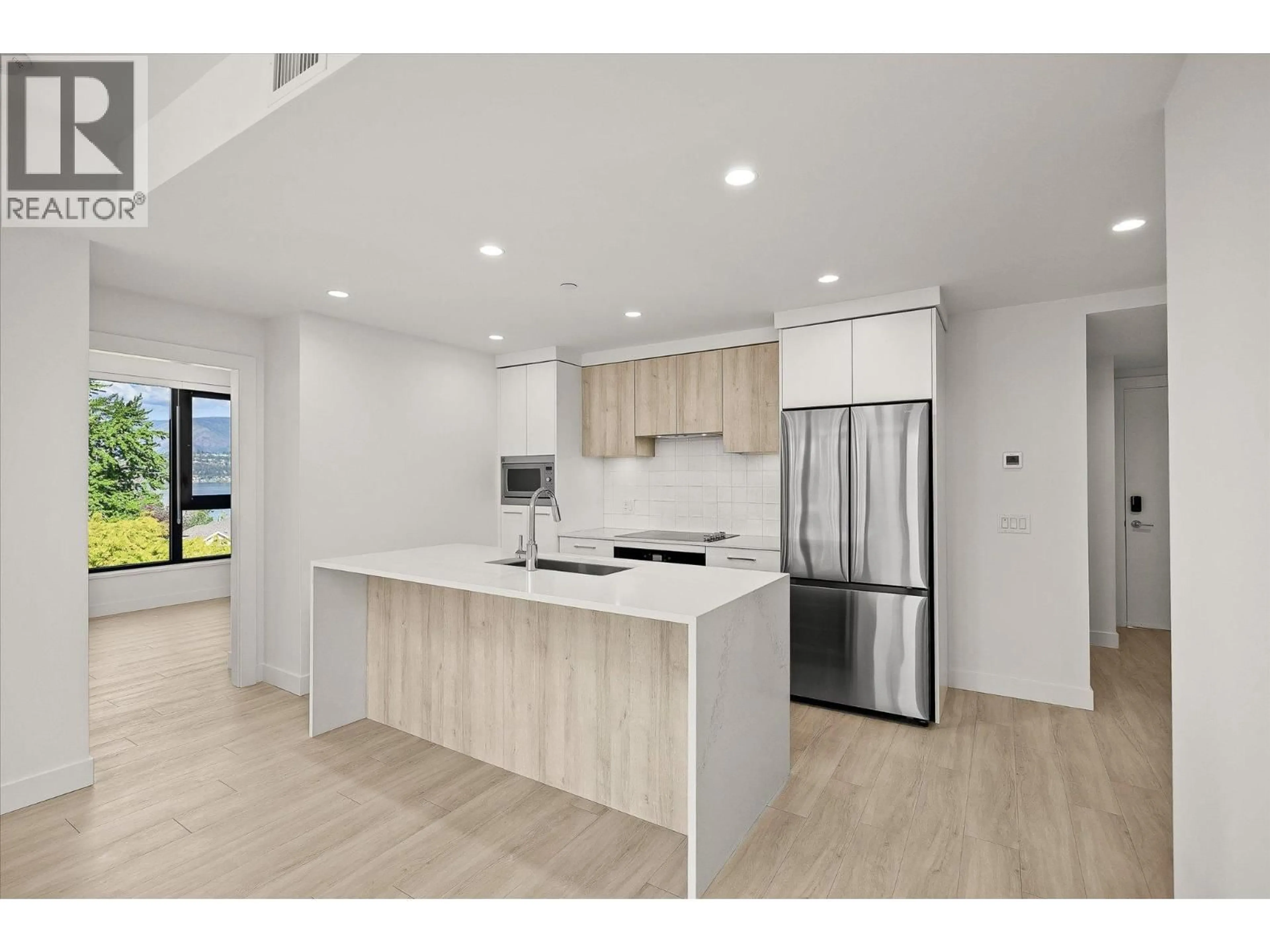 Open concept kitchen, unknown for 508 - 3699 CAPOZZI ROAD, Kelowna British Columbia V1W0G3