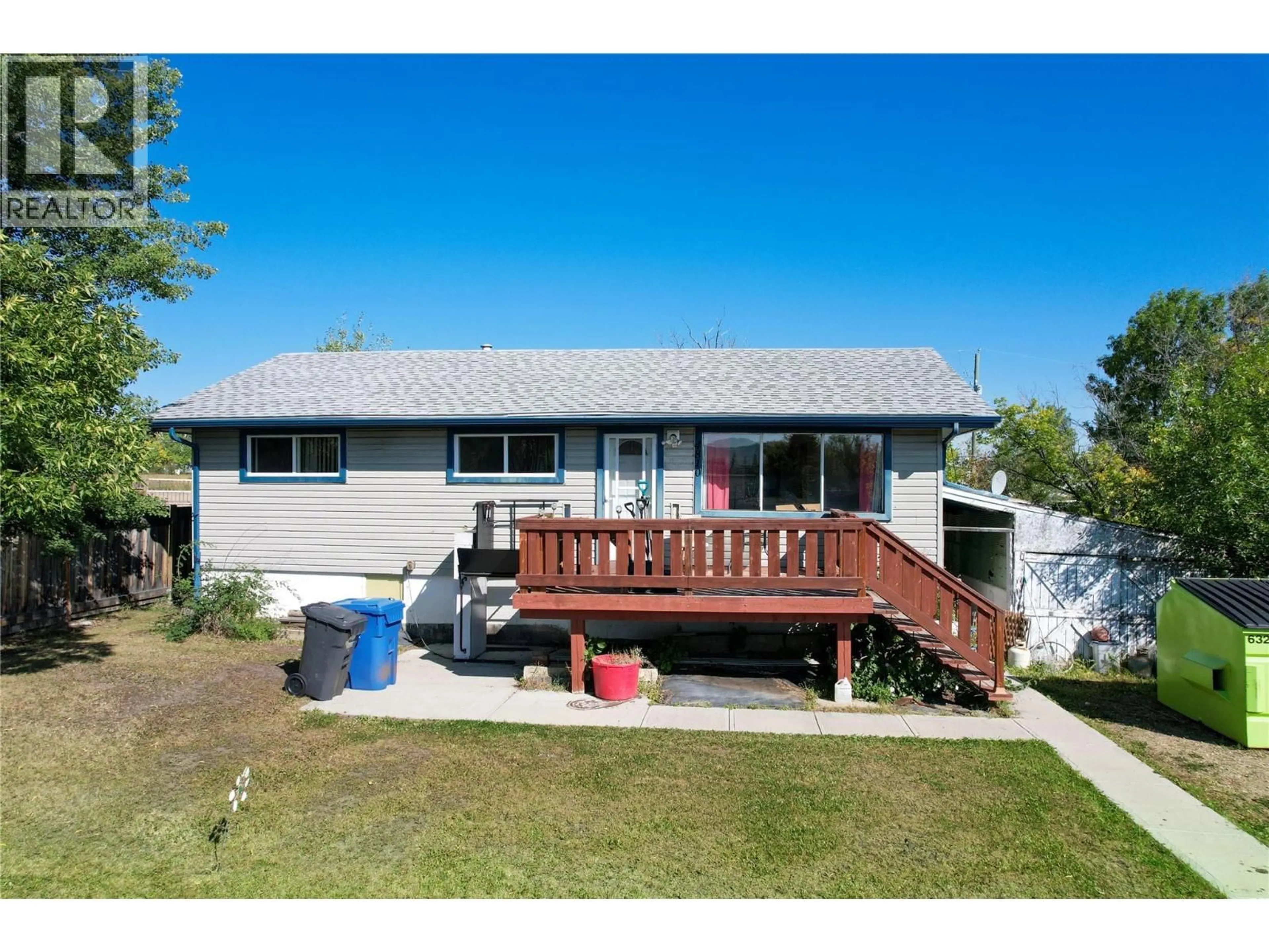 Home with vinyl exterior material, street for 4810 48 AVENUE, Pouce Coupe British Columbia V0C2C0