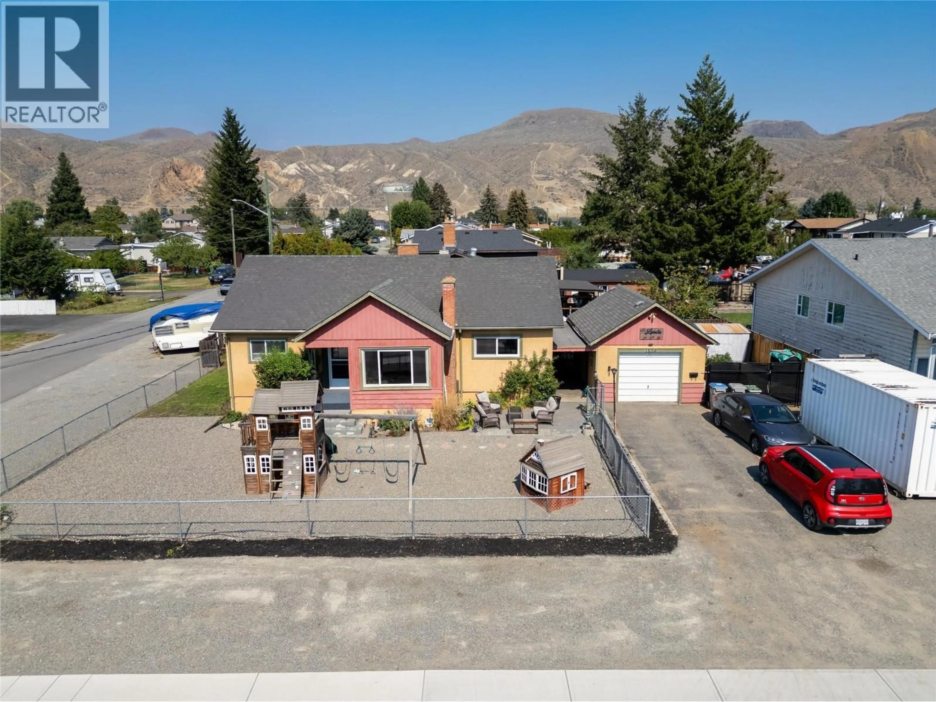 A pic from outside/outdoor area/front of a property/back of a property/a pic from drone, mountain view for 1854 FLEETWOOD AVENUE, Kamloops British Columbia V2B4S1