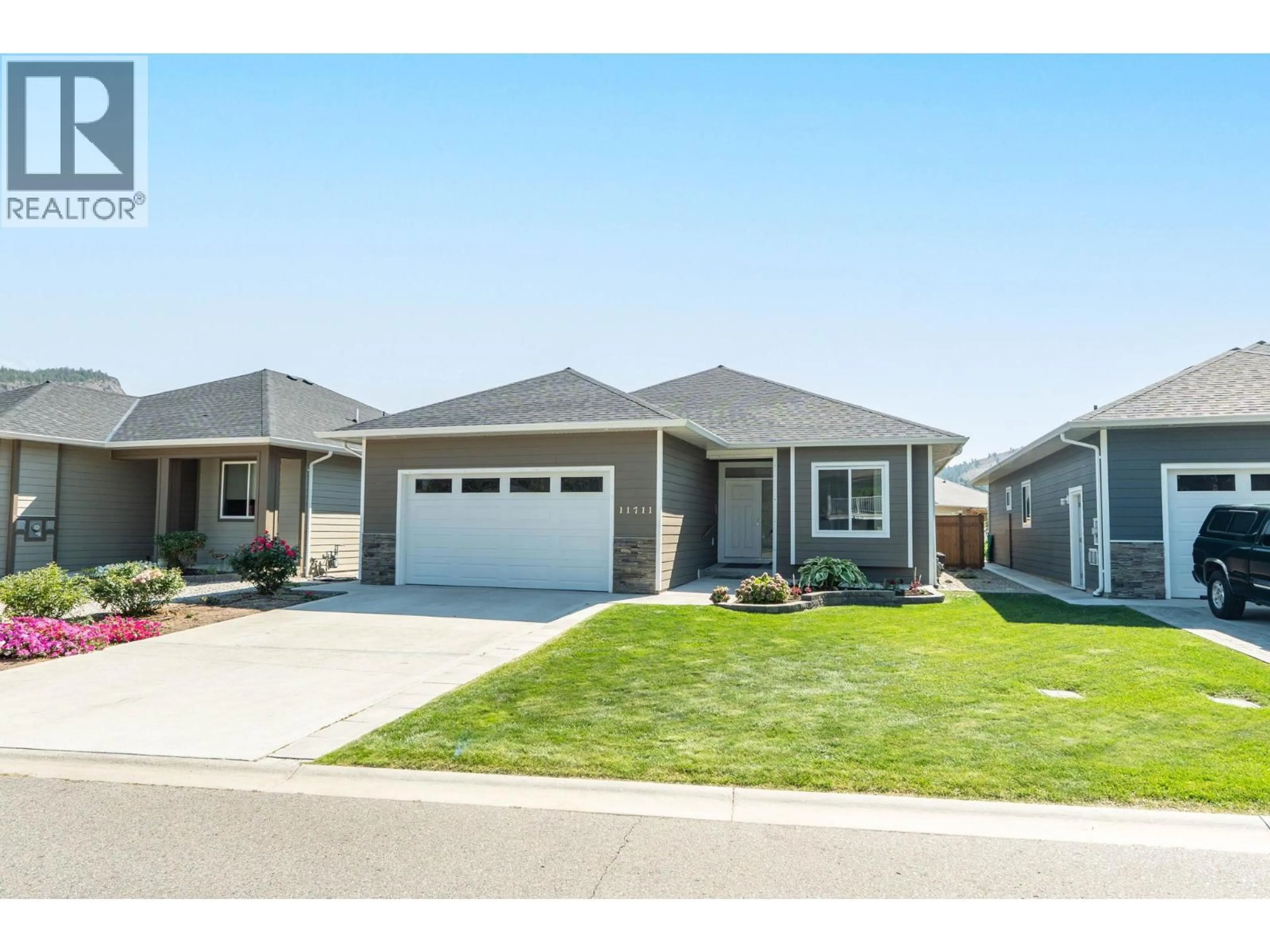 Home with vinyl exterior material, street for 11711 KARLSTROM PLACE, Summerland British Columbia V0H1Z8