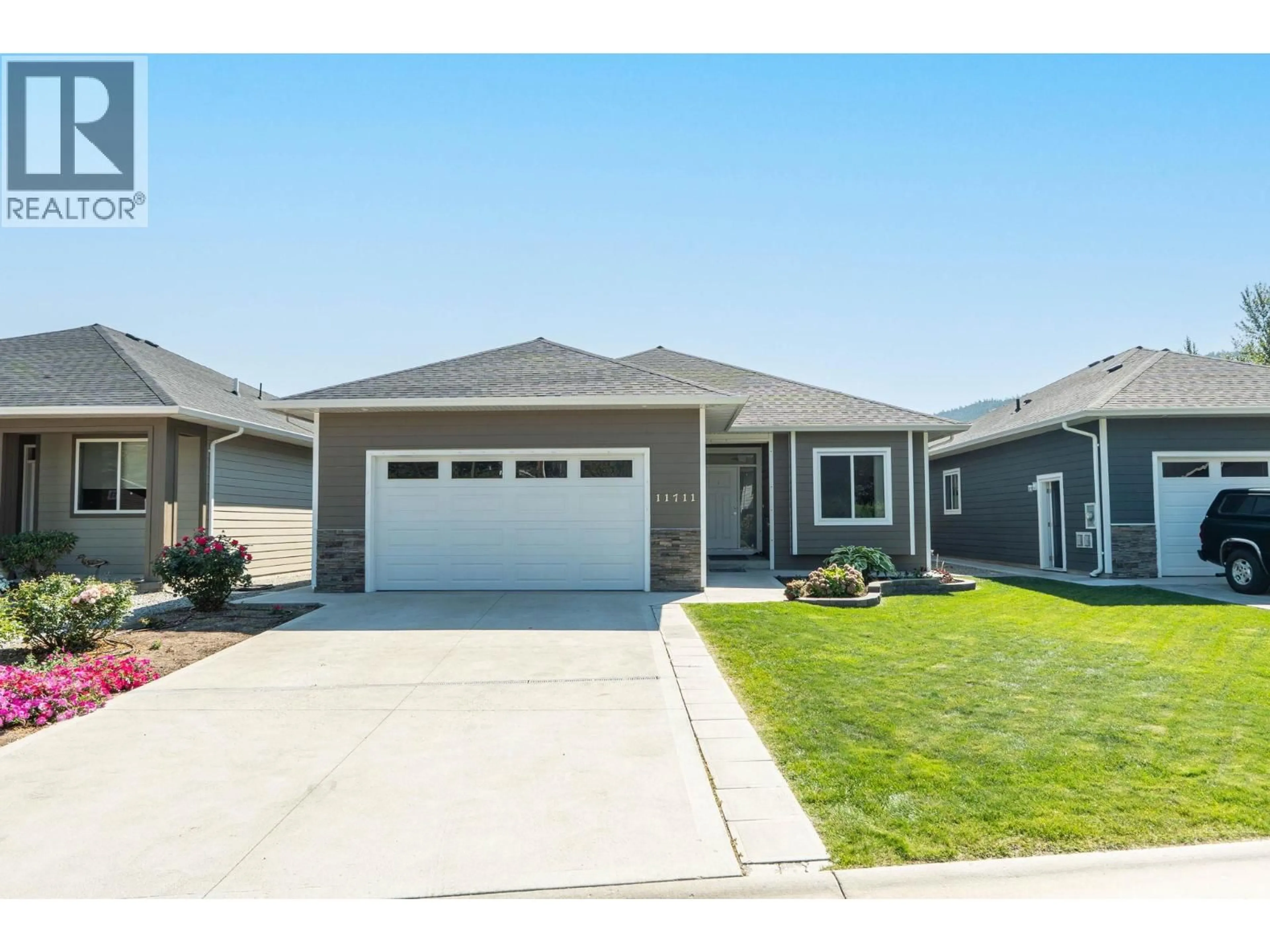 Home with vinyl exterior material, street for 11711 KARLSTROM PLACE, Summerland British Columbia V0H1Z8