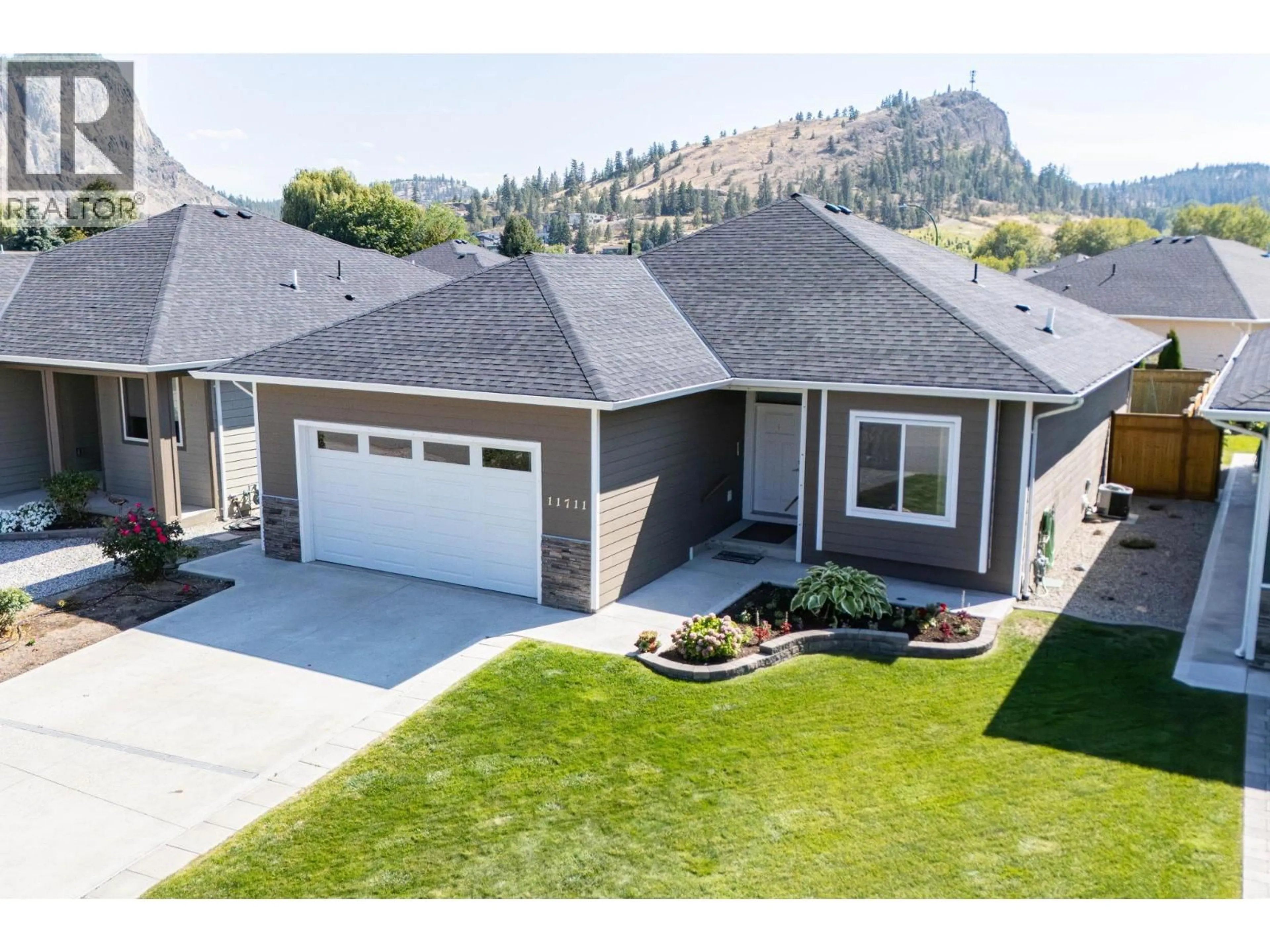 Home with vinyl exterior material, street for 11711 KARLSTROM PLACE, Summerland British Columbia V0H1Z8