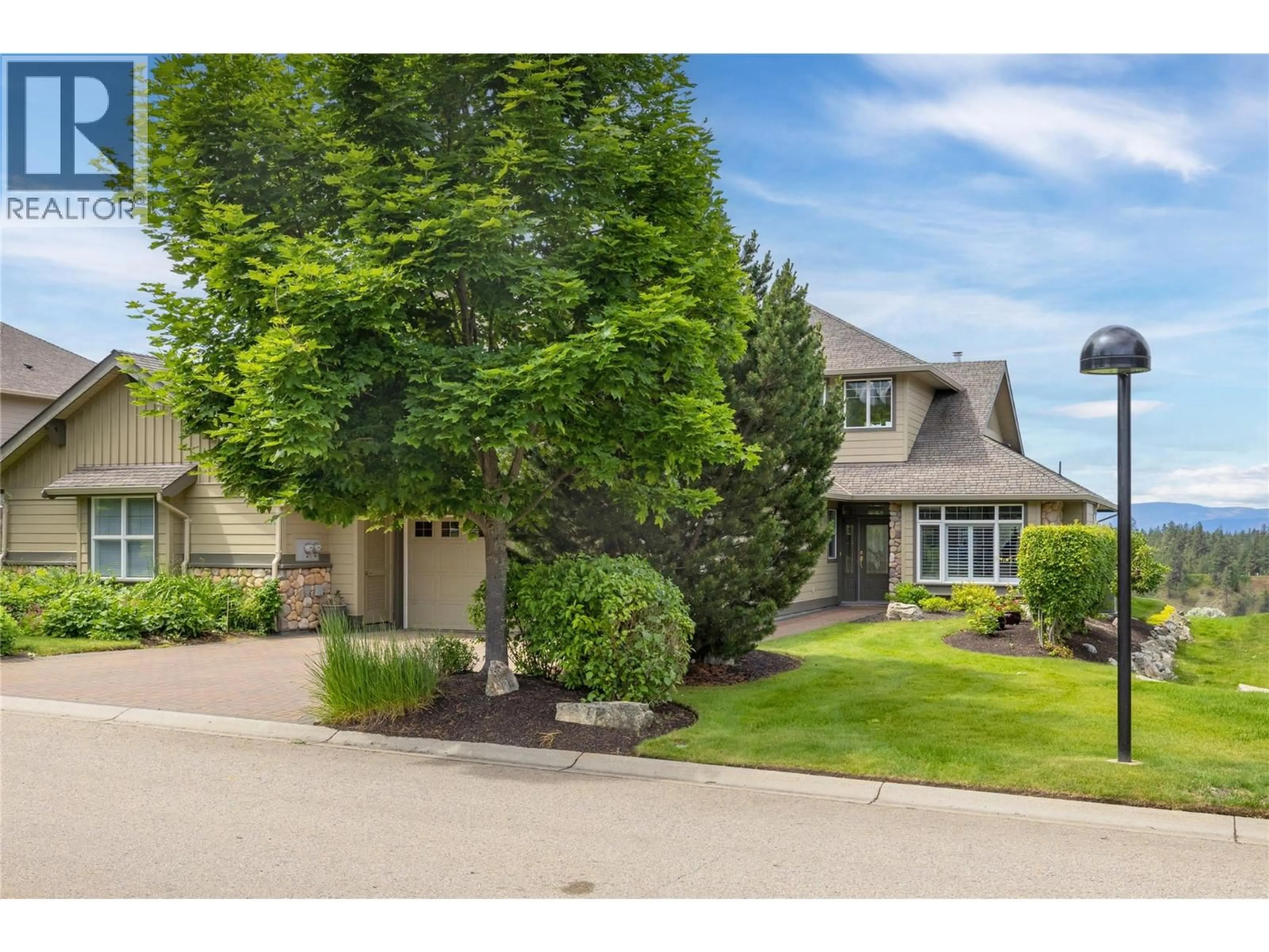A pic from outside/outdoor area/front of a property/back of a property/a pic from drone, street for 14 - 3800 GALLAGHERS PINNACLE WAY, Kelowna British Columbia V1Y3Z8