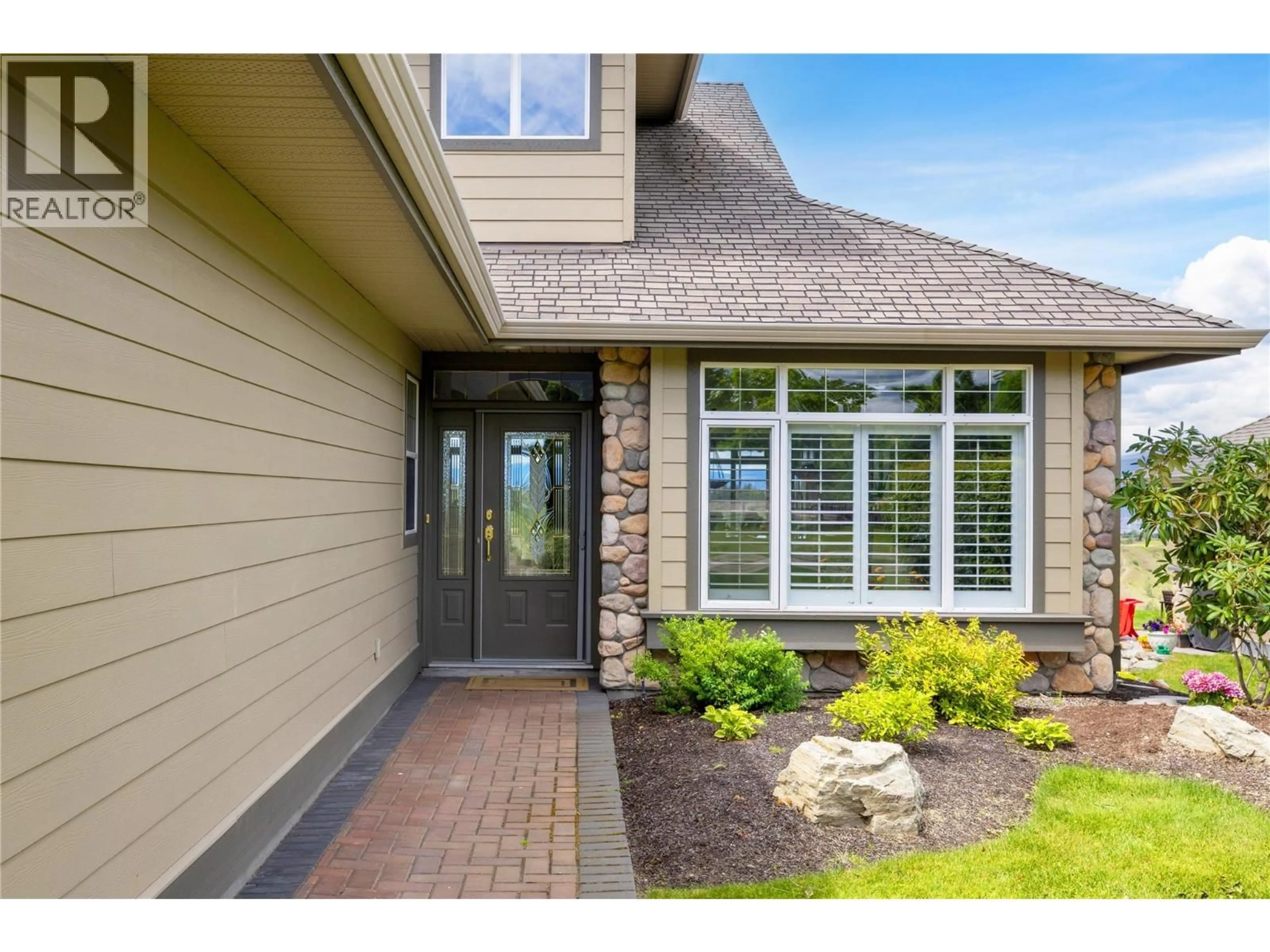 Home with brick exterior material, street for 14 - 3800 GALLAGHERS PINNACLE WAY, Kelowna British Columbia V1Y3Z8