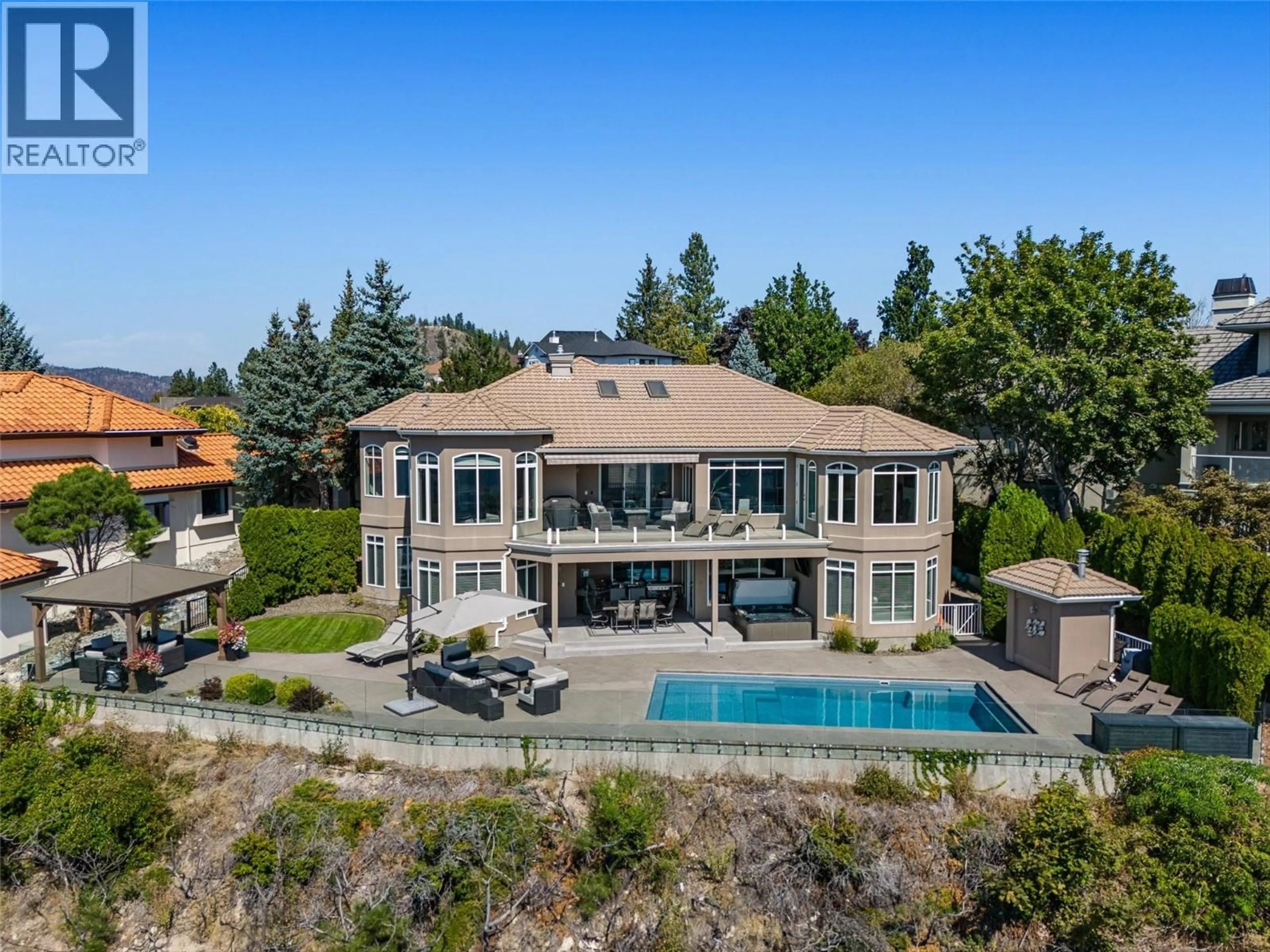 A pic from outside/outdoor area/front of a property/back of a property/a pic from drone, water/lake/river/ocean view for 994 SKEENA DRIVE, Kelowna British Columbia V1V2K7