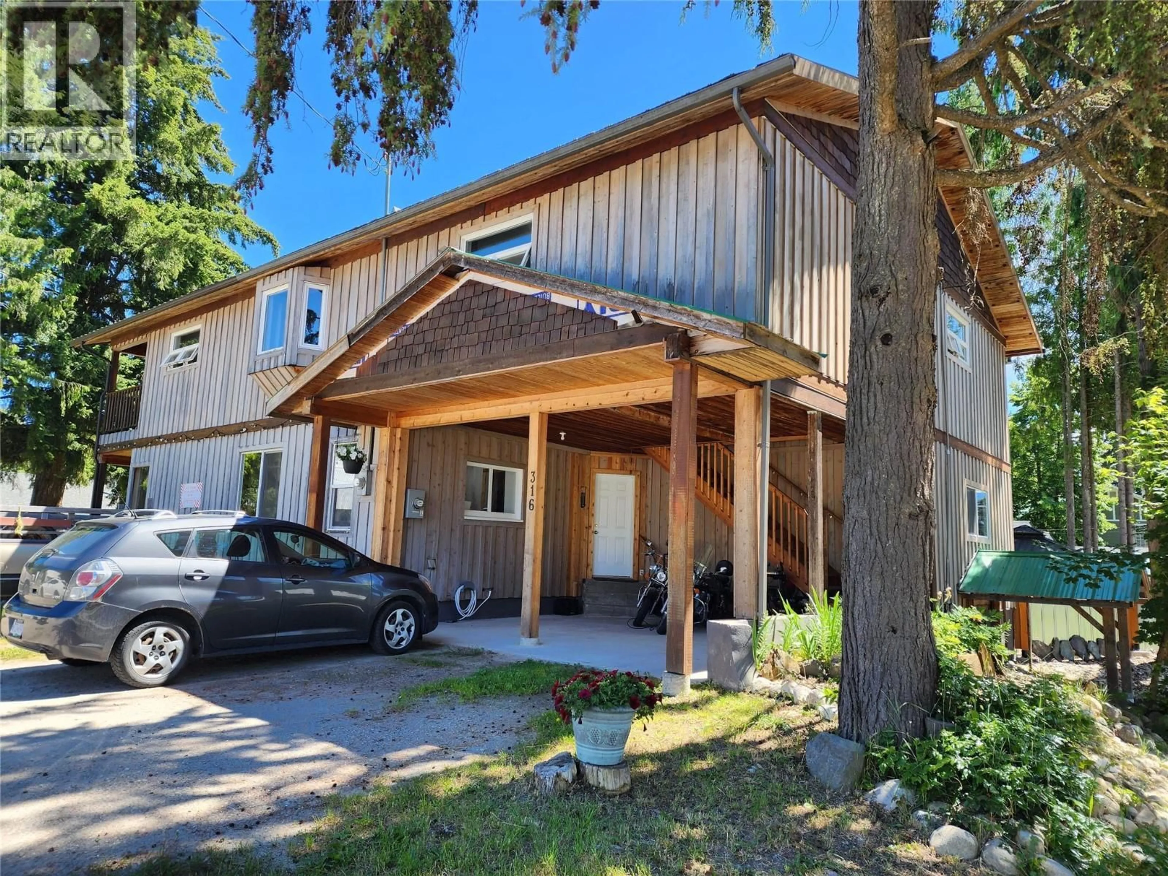 A pic from outside/outdoor area/front of a property/back of a property/a pic from drone, street for 316 3RD  NW AVENUE, Nakusp British Columbia V0G1R0