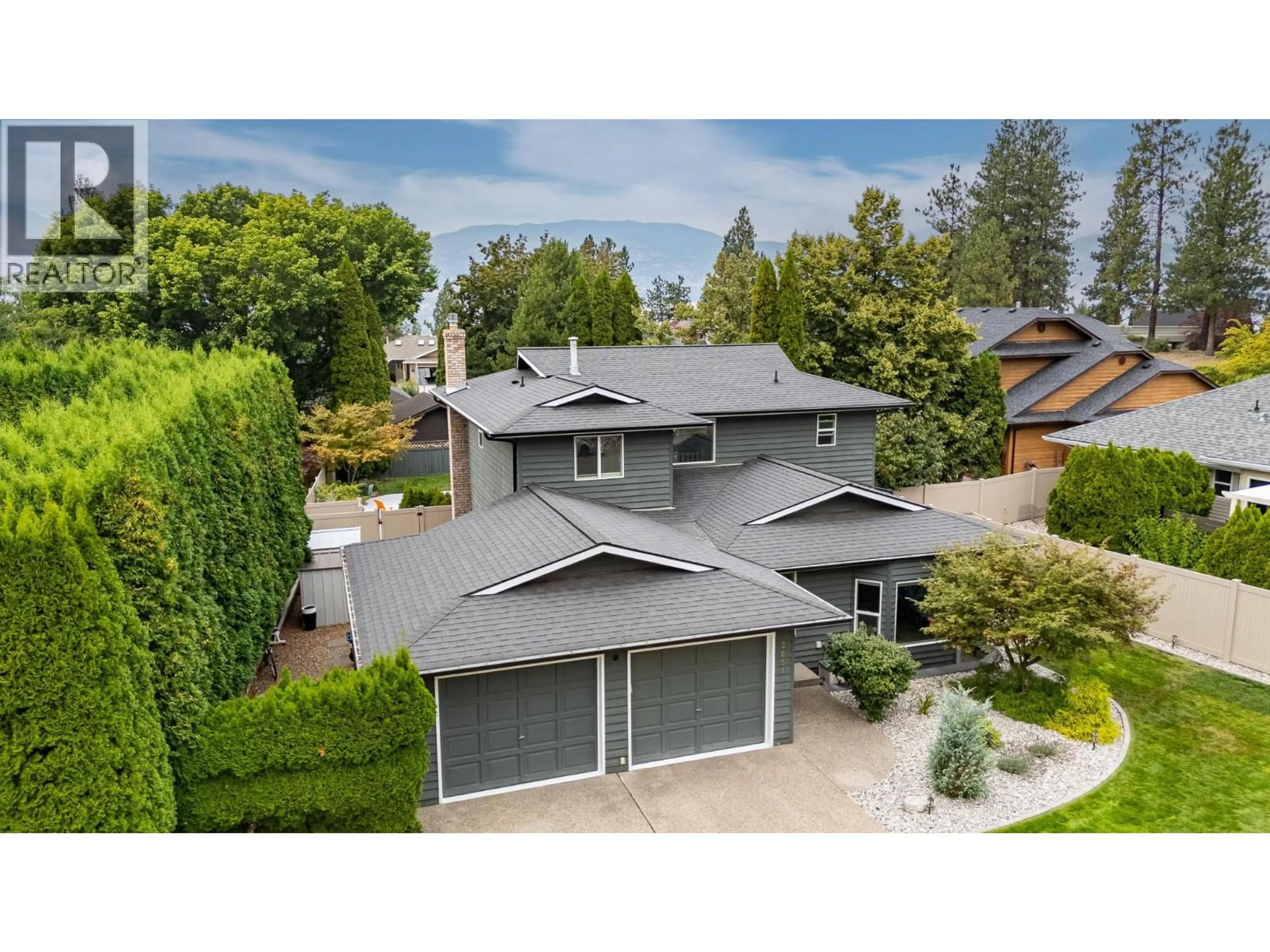 A pic from outside/outdoor area/front of a property/back of a property/a pic from drone, street for 2651 EVERGREEN DRIVE, Penticton British Columbia V2A8C6