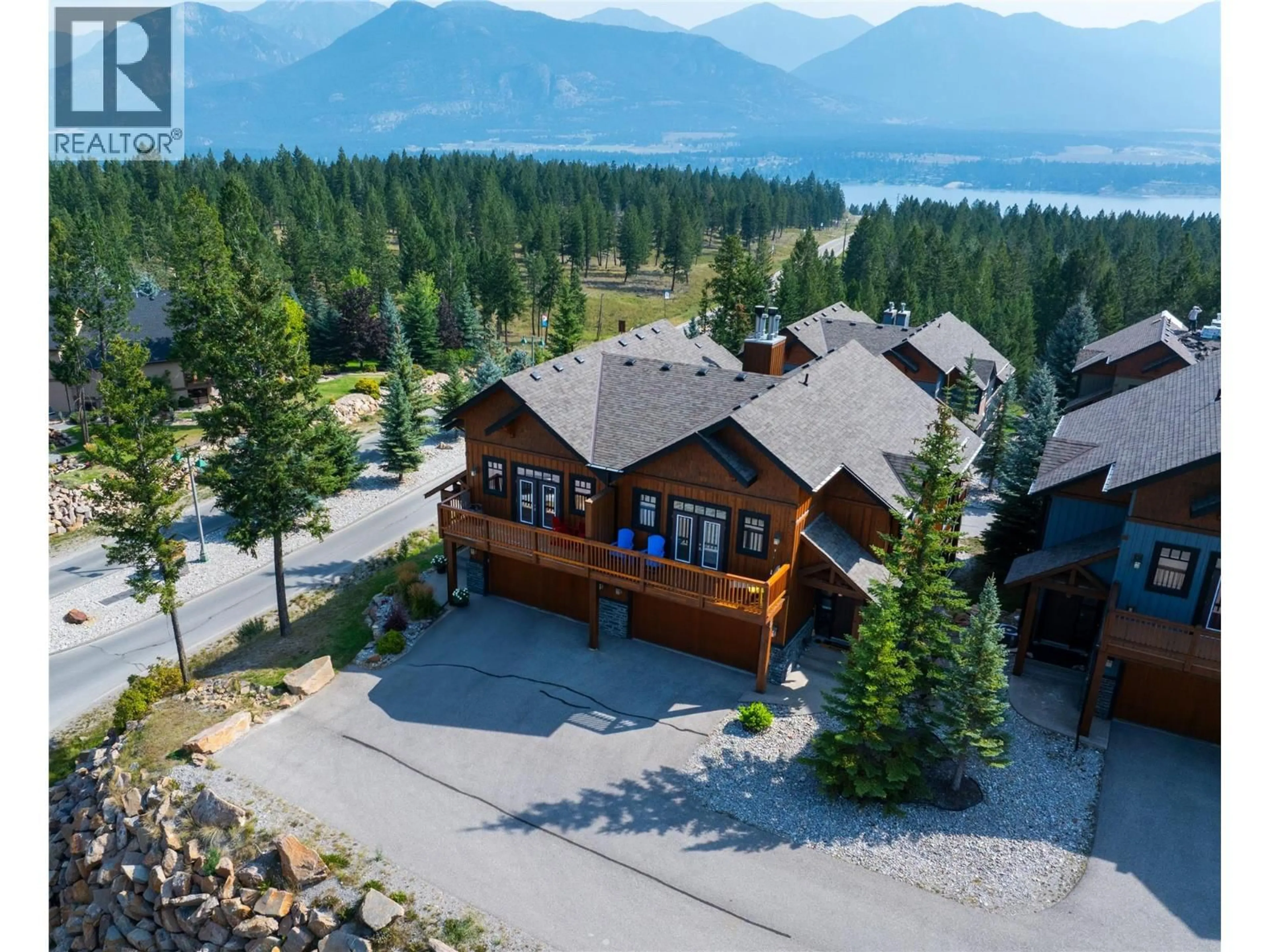 A pic from outside/outdoor area/front of a property/back of a property/a pic from drone, water/lake/river/ocean view for 26 - 2600 RIVERROCK RISE, Invermere British Columbia V0A1K6