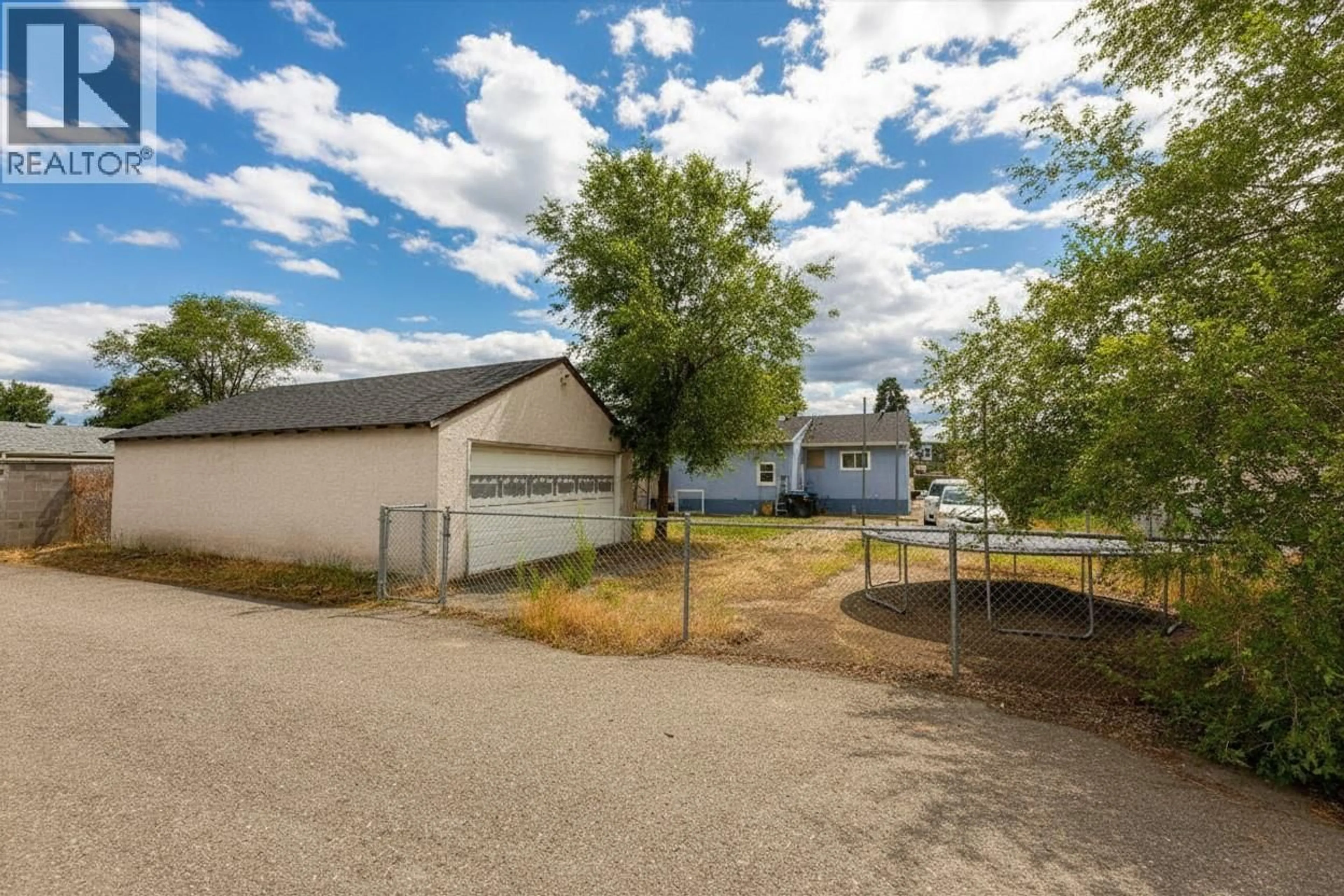 A pic from outside/outdoor area/front of a property/back of a property/a pic from drone, unknown for 525 DONHAUSER ROAD, Kelowna British Columbia V1X3G1