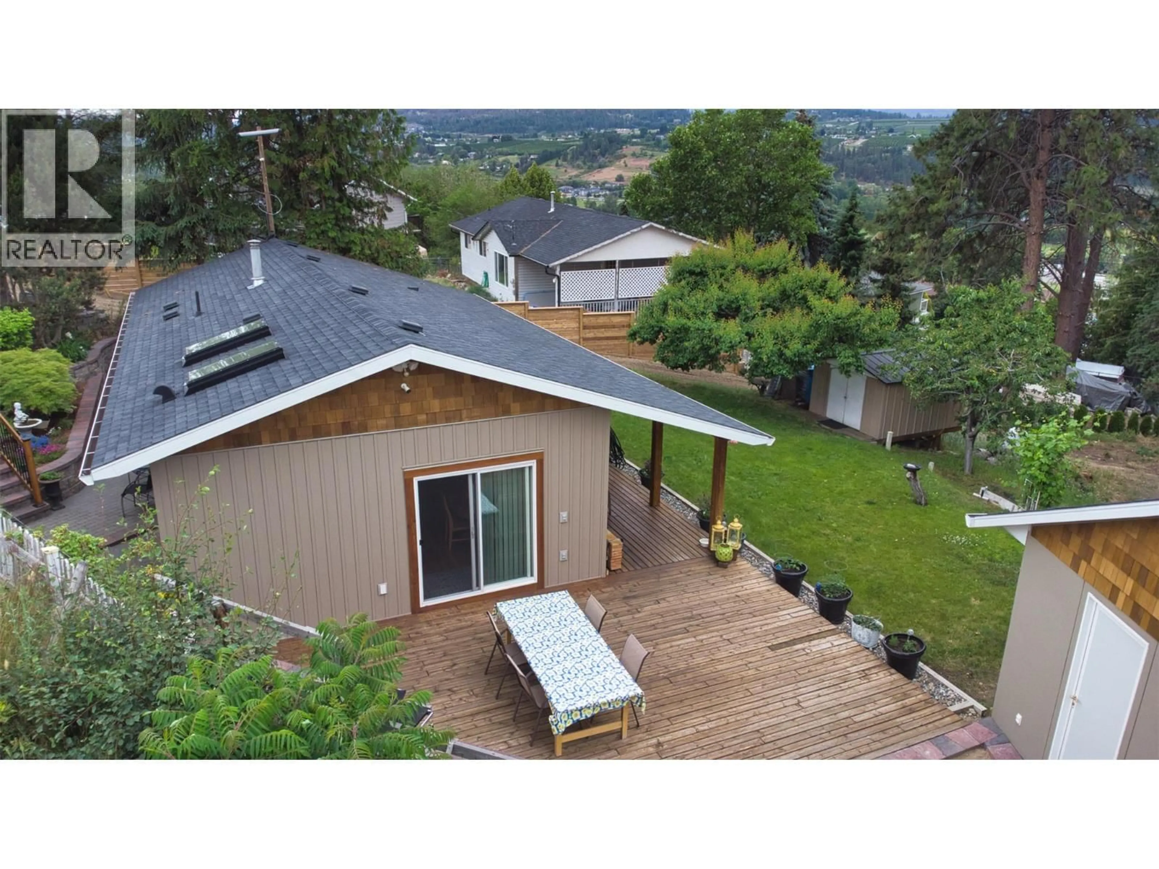 A pic from outside/outdoor area/front of a property/back of a property/a pic from drone, mountain view for 11130 VELDA ROAD, Lake Country British Columbia V4V1W7