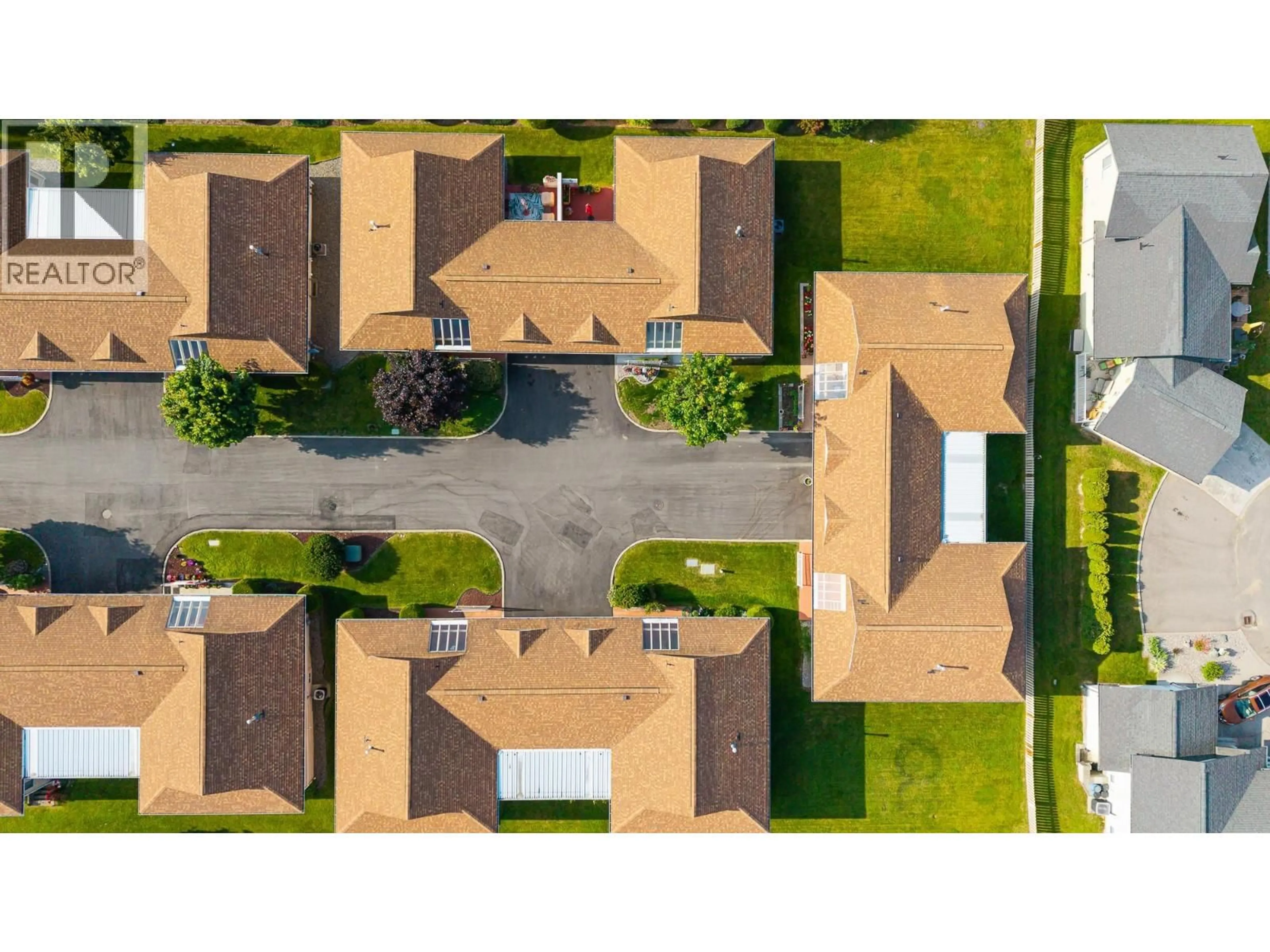A pic from outside/outdoor area/front of a property/back of a property/a pic from drone, street for 6 - 518 18TH AVENUE SOUTH, Creston British Columbia V0B1G5