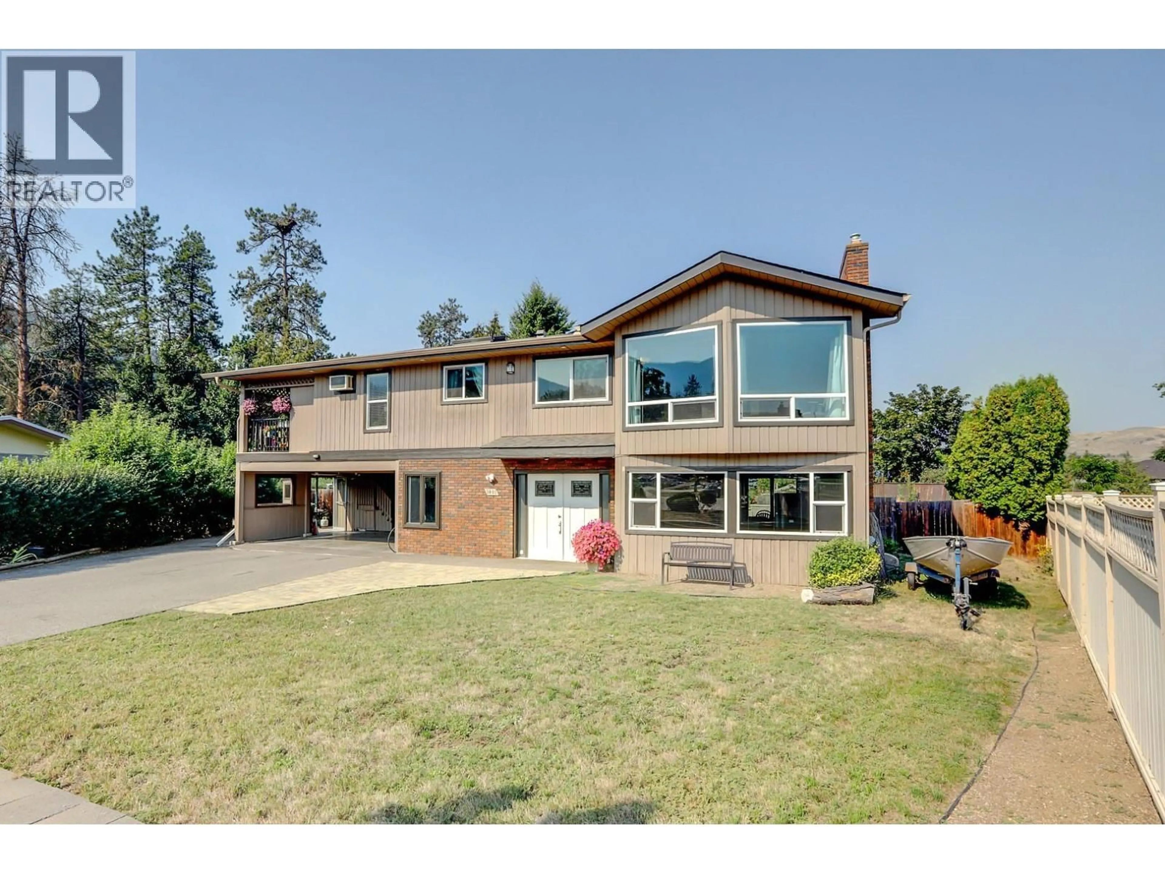 Home with brick exterior material, unknown for 9401 BEL AIR DRIVE, Coldstream British Columbia V1B2A1
