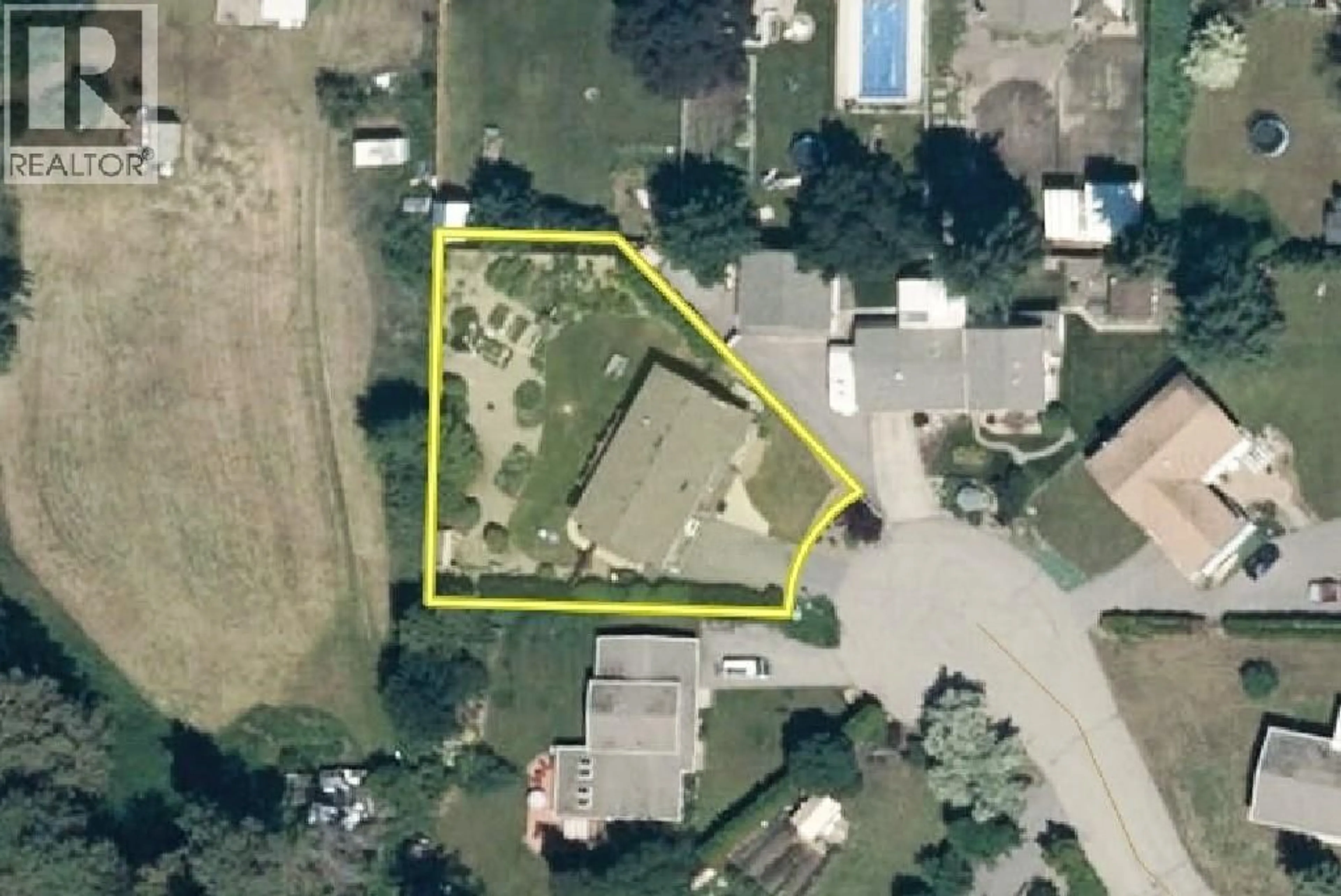 A pic from outside/outdoor area/front of a property/back of a property/a pic from drone, street for 9401 BEL AIR DRIVE, Coldstream British Columbia V1B2A1
