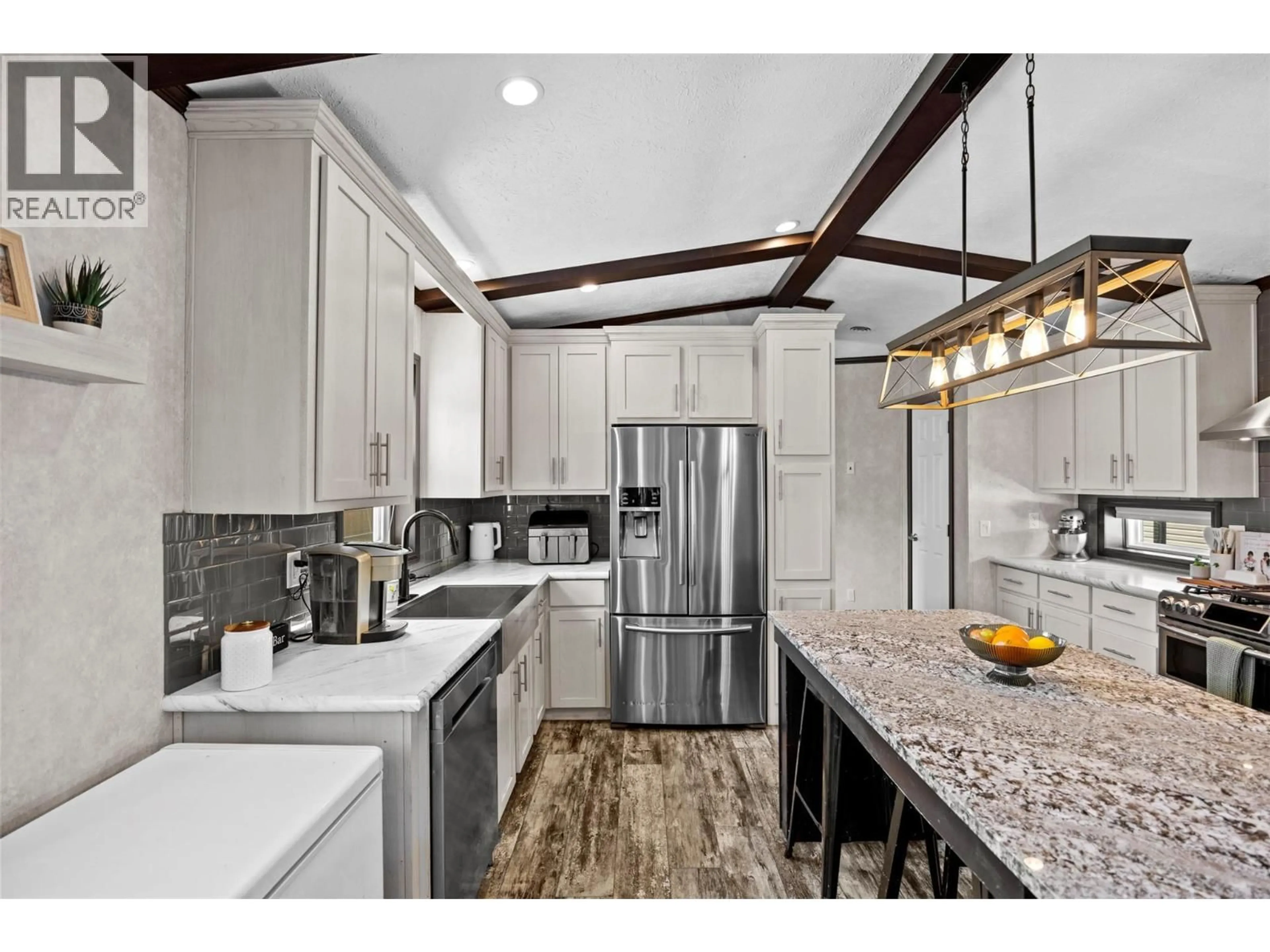 Open concept kitchen, ceramic/tile floor for 103 - 5005 RIVER ROAD, Pritchard British Columbia V0E2P0