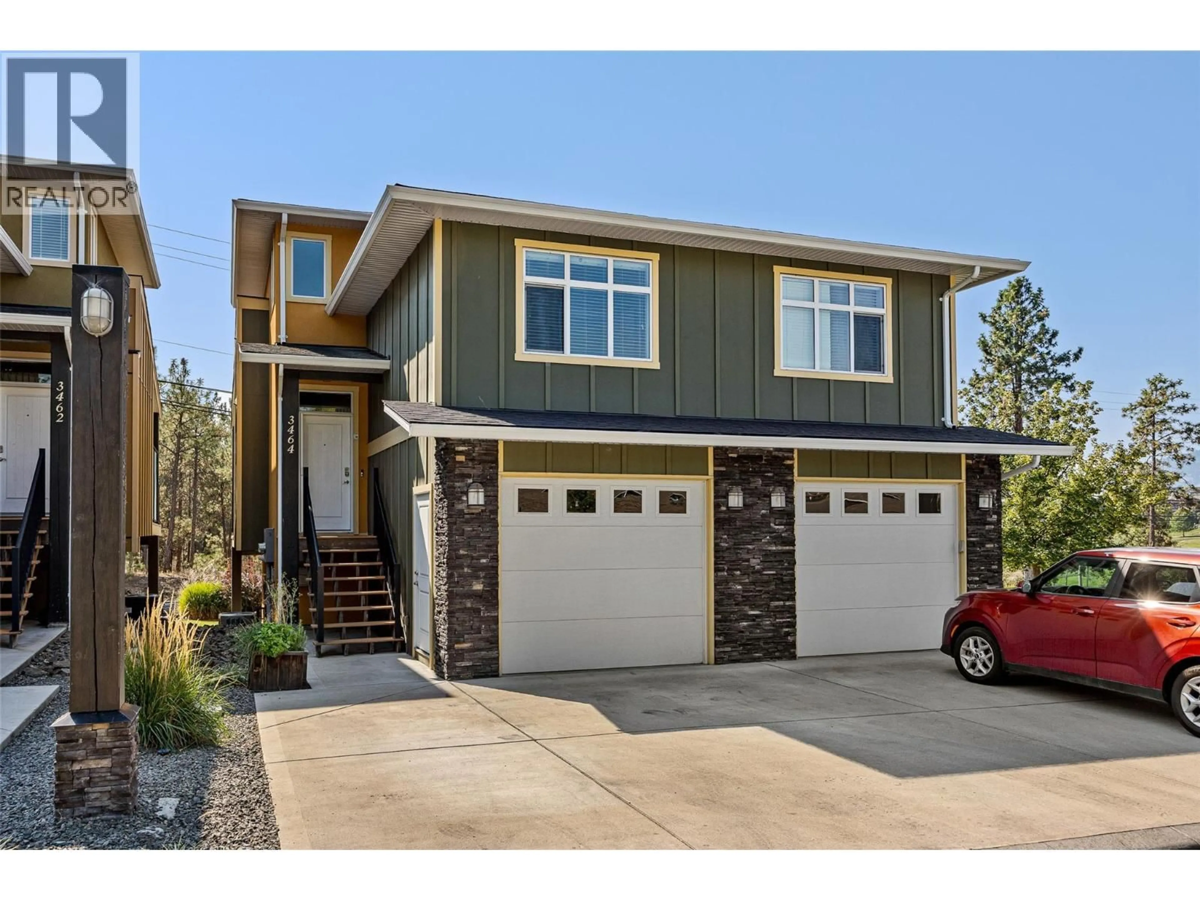 Home with vinyl exterior material, street for 3464 COUGAR ROAD, West Kelowna British Columbia V4T2G9
