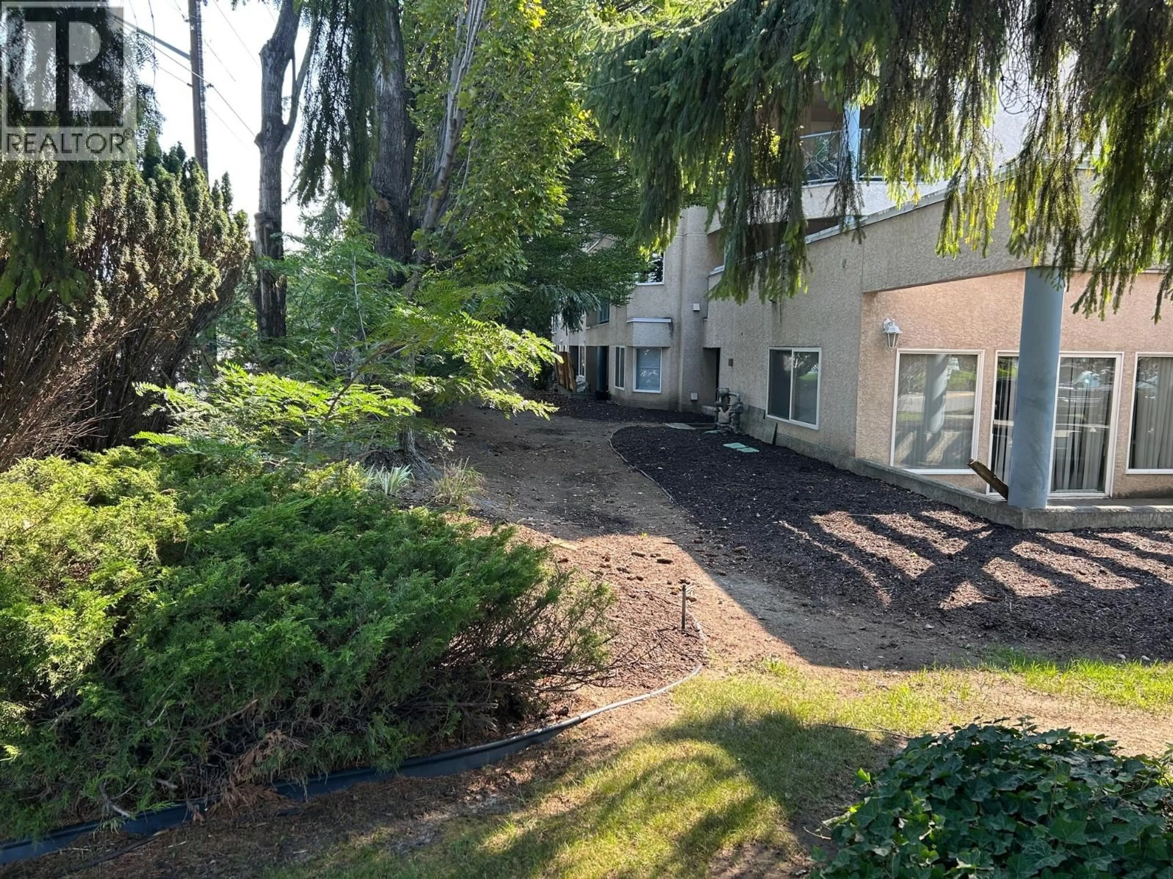 A pic from outside/outdoor area/front of a property/back of a property/a pic from drone, unknown for 103 - 3115 DE MONTREUIL COURT, Kelowna British Columbia V1W3W1