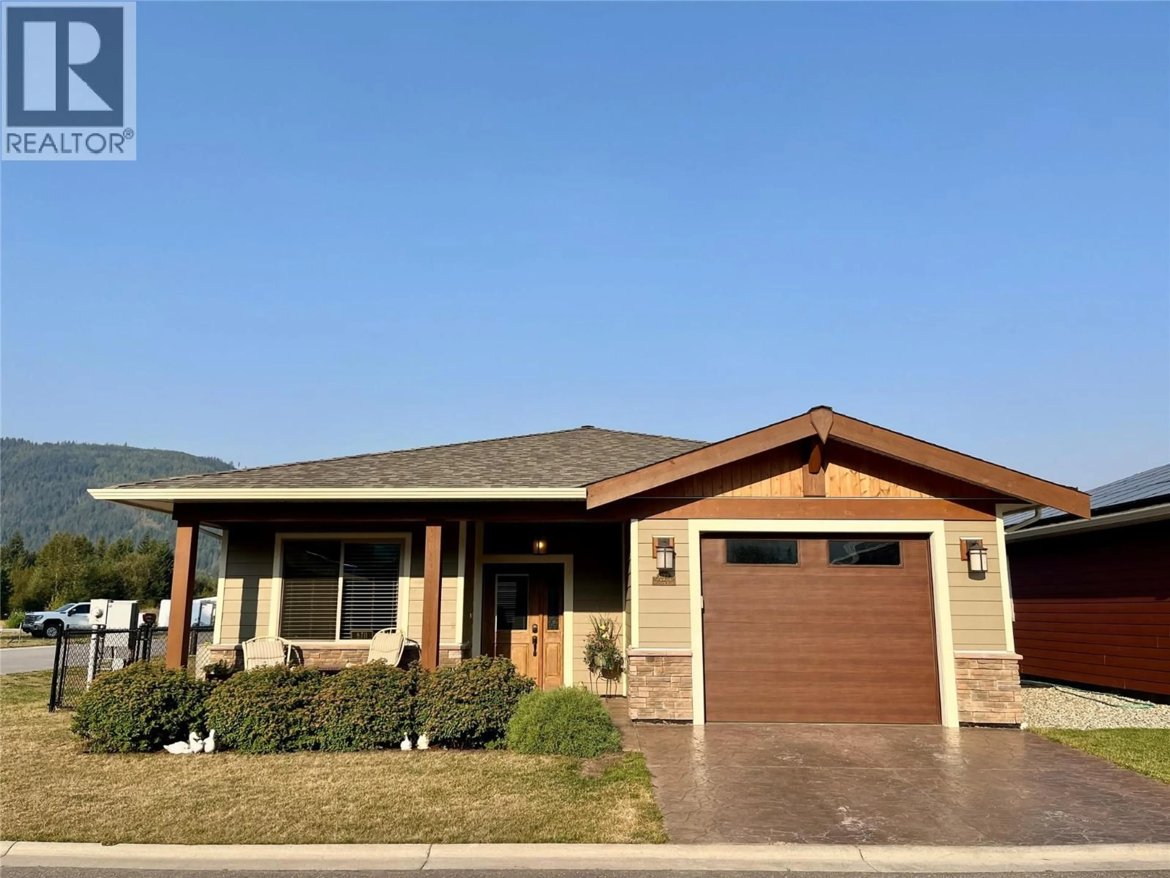Home with brick exterior material, street for 1132 WILLOW ROW, Sicamous British Columbia V0E2V0