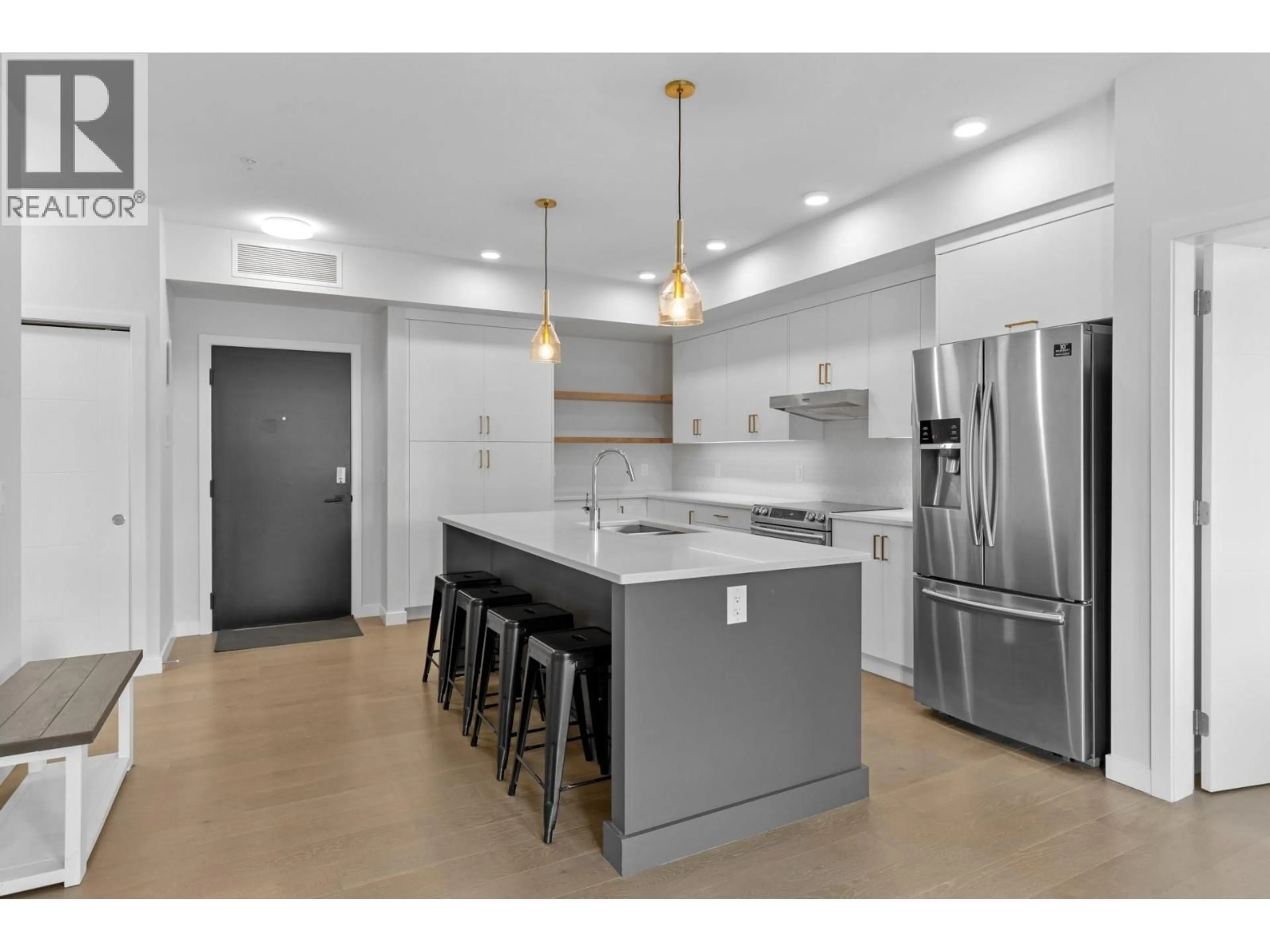Open concept kitchen, ceramic/tile floor for 509 - 1215 ST. PAUL STREET, Kelowna British Columbia V1Y2C7