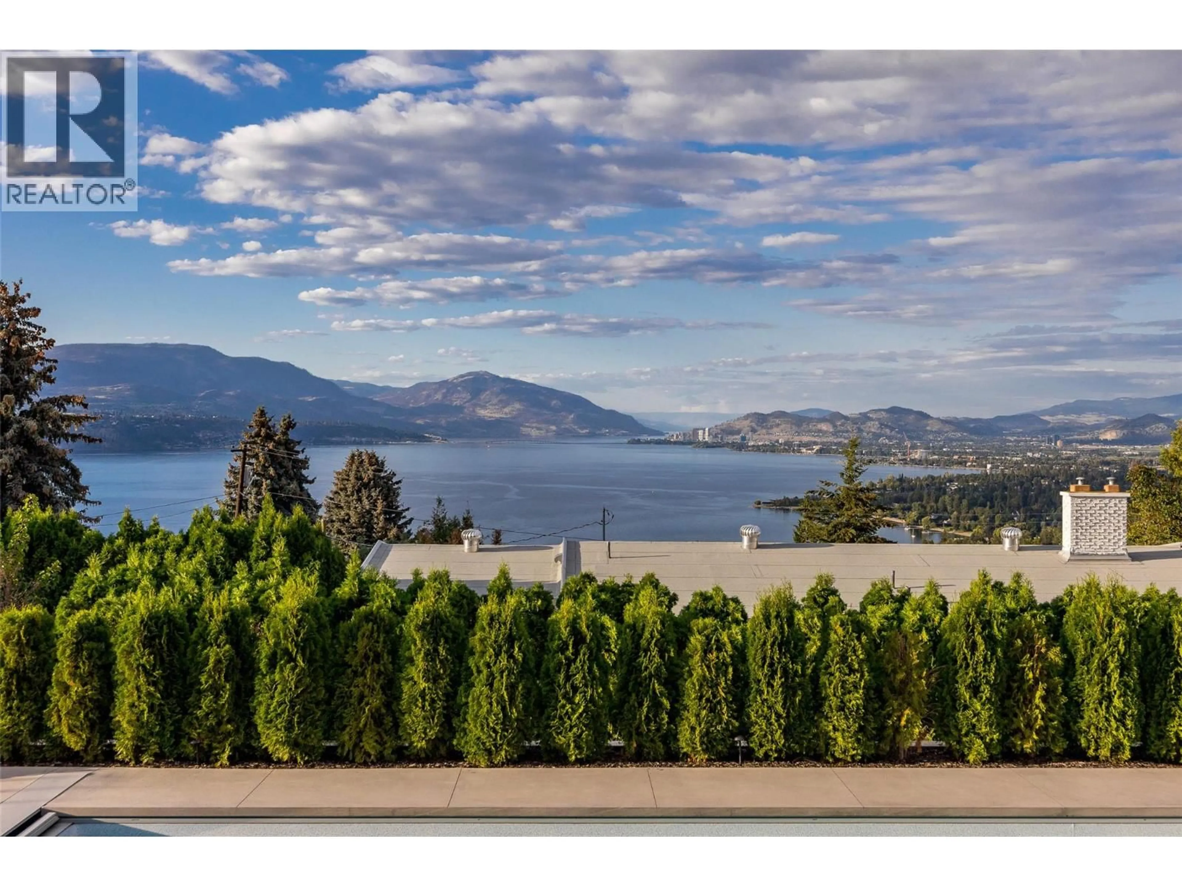 A pic from outside/outdoor area/front of a property/back of a property/a pic from drone, water/lake/river/ocean view for 415 CURLEW DRIVE, Kelowna British Columbia V1W4L1