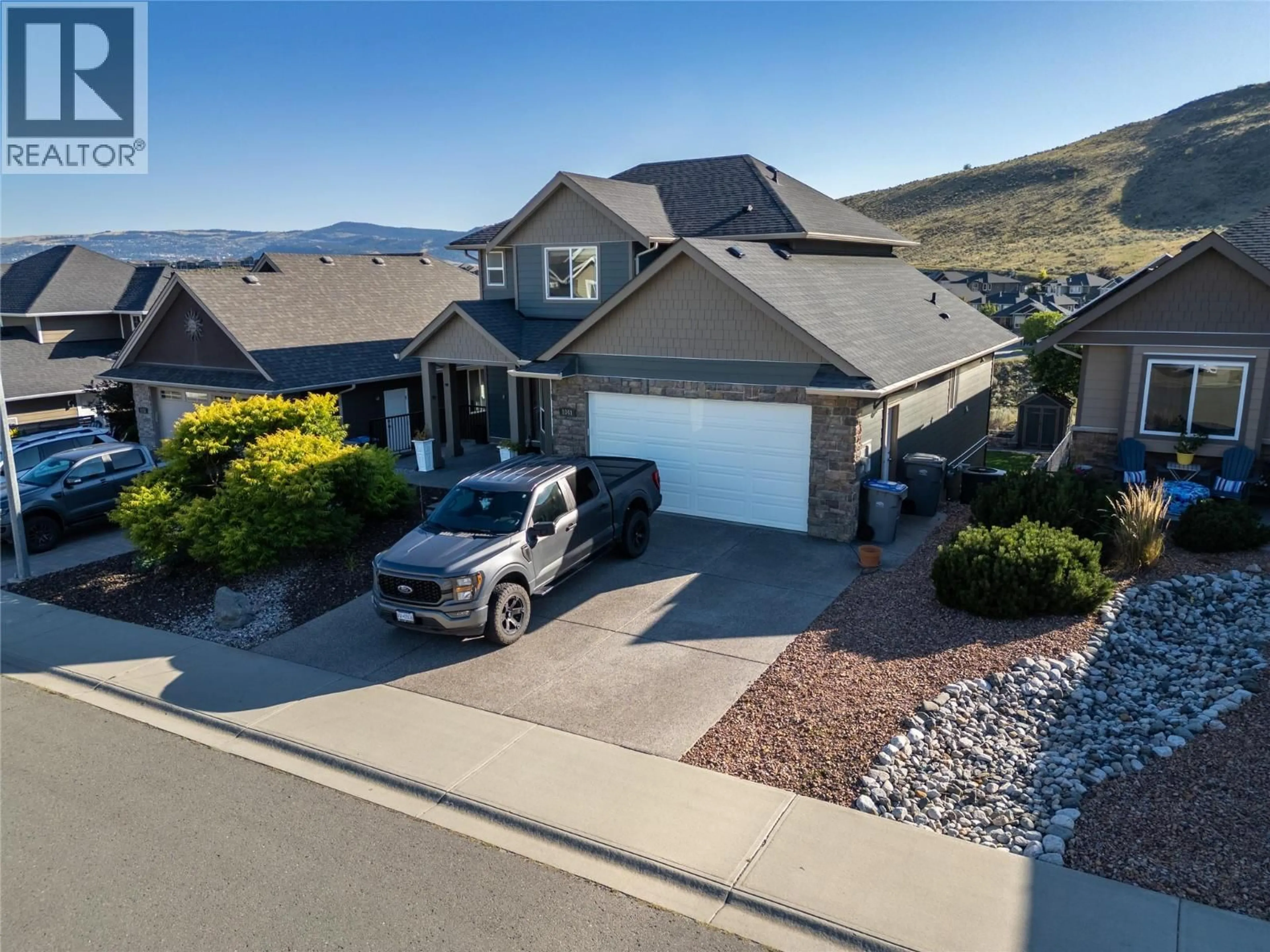 A pic from outside/outdoor area/front of a property/back of a property/a pic from drone, mountain view for 1041 SADDLEBACK COURT, Kamloops British Columbia V2B0B9