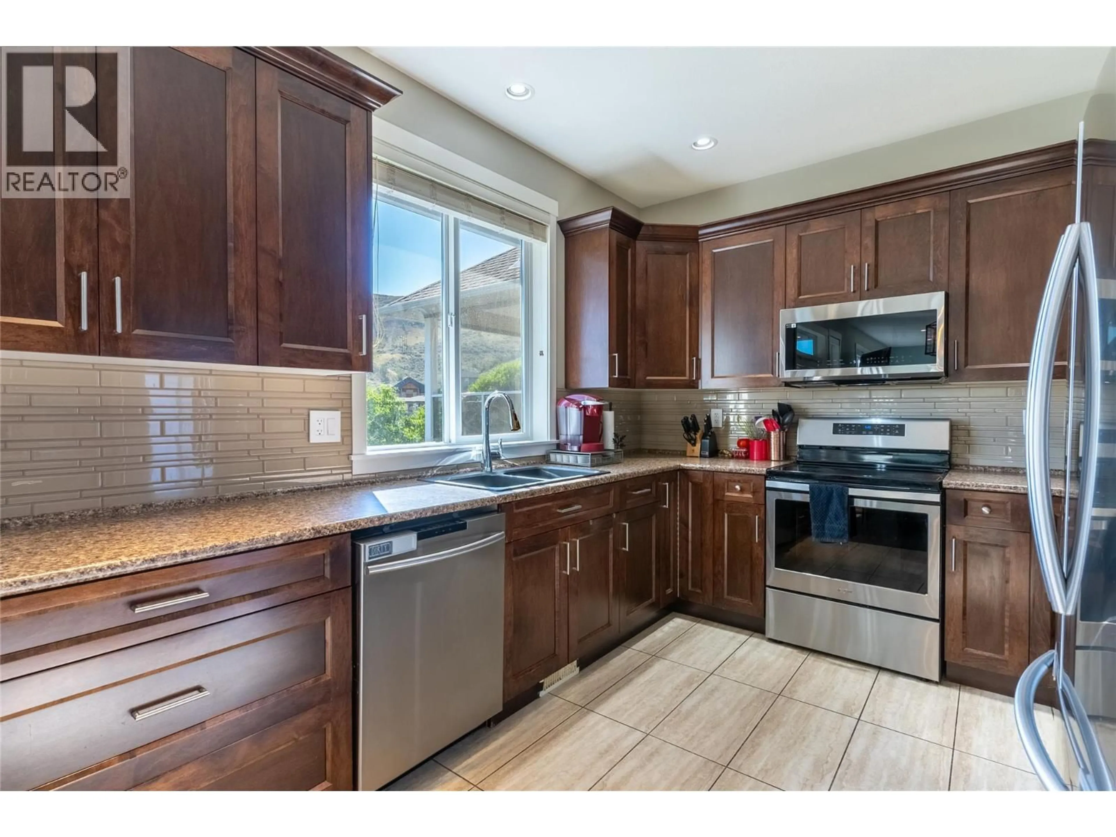 Open concept kitchen, ceramic/tile floor for 1041 SADDLEBACK COURT, Kamloops British Columbia V2B0B9