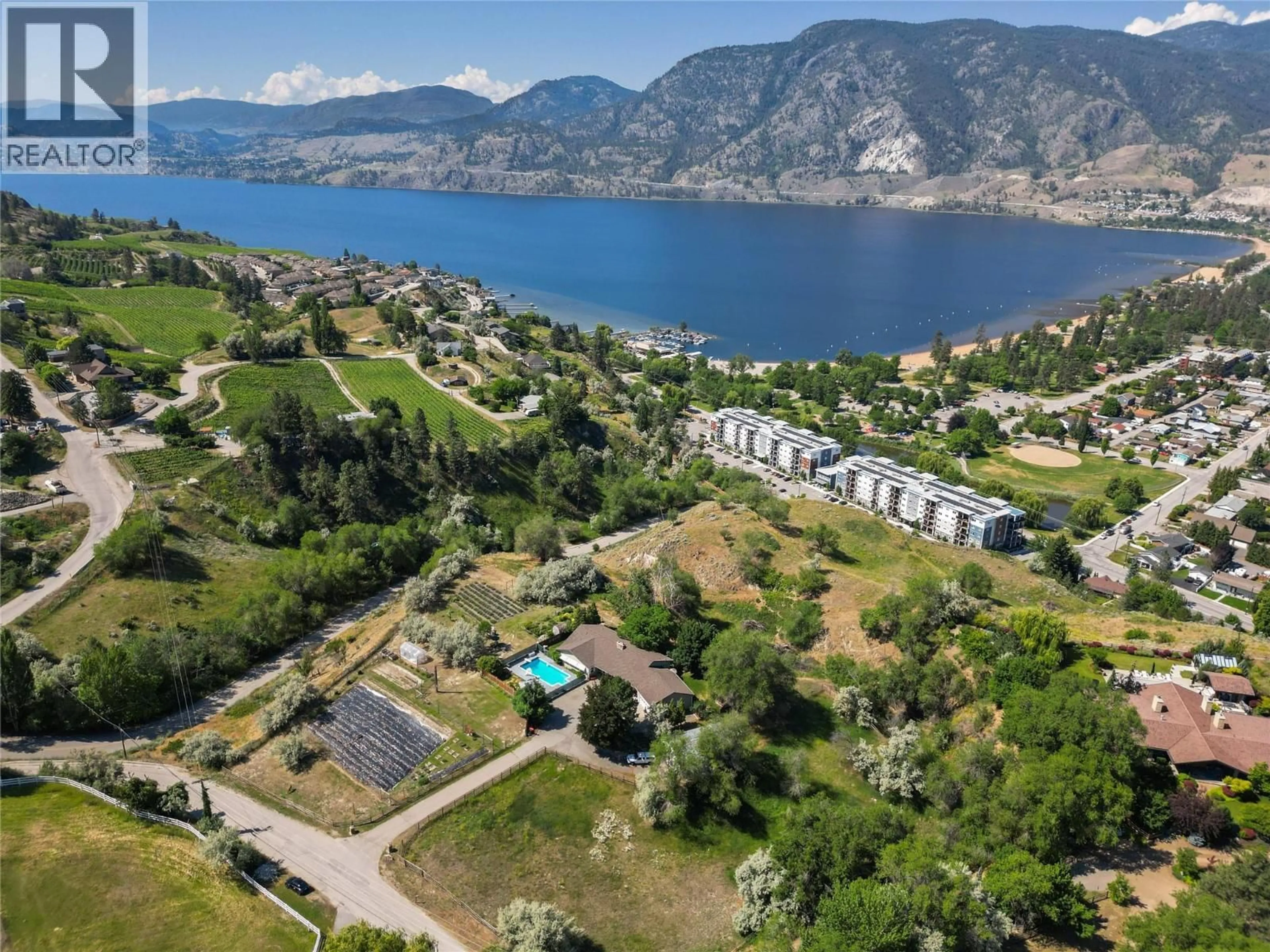 A pic from outside/outdoor area/front of a property/back of a property/a pic from drone, unknown for 3575 VALLEYVIEW ROAD, Penticton British Columbia V2A8W9