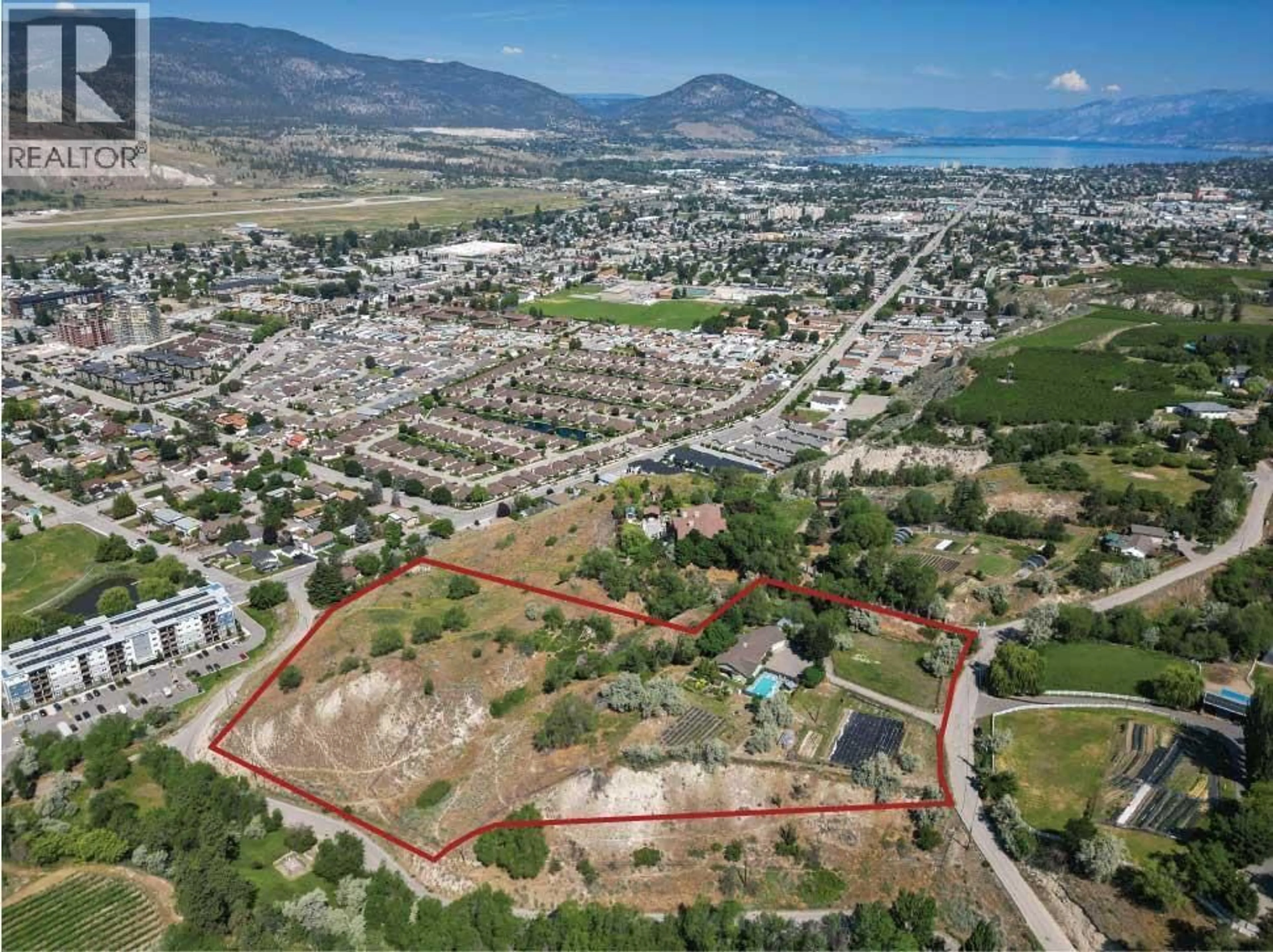 A pic from outside/outdoor area/front of a property/back of a property/a pic from drone, mountain view for 3575 VALLEYVIEW ROAD, Penticton British Columbia V2A8W9