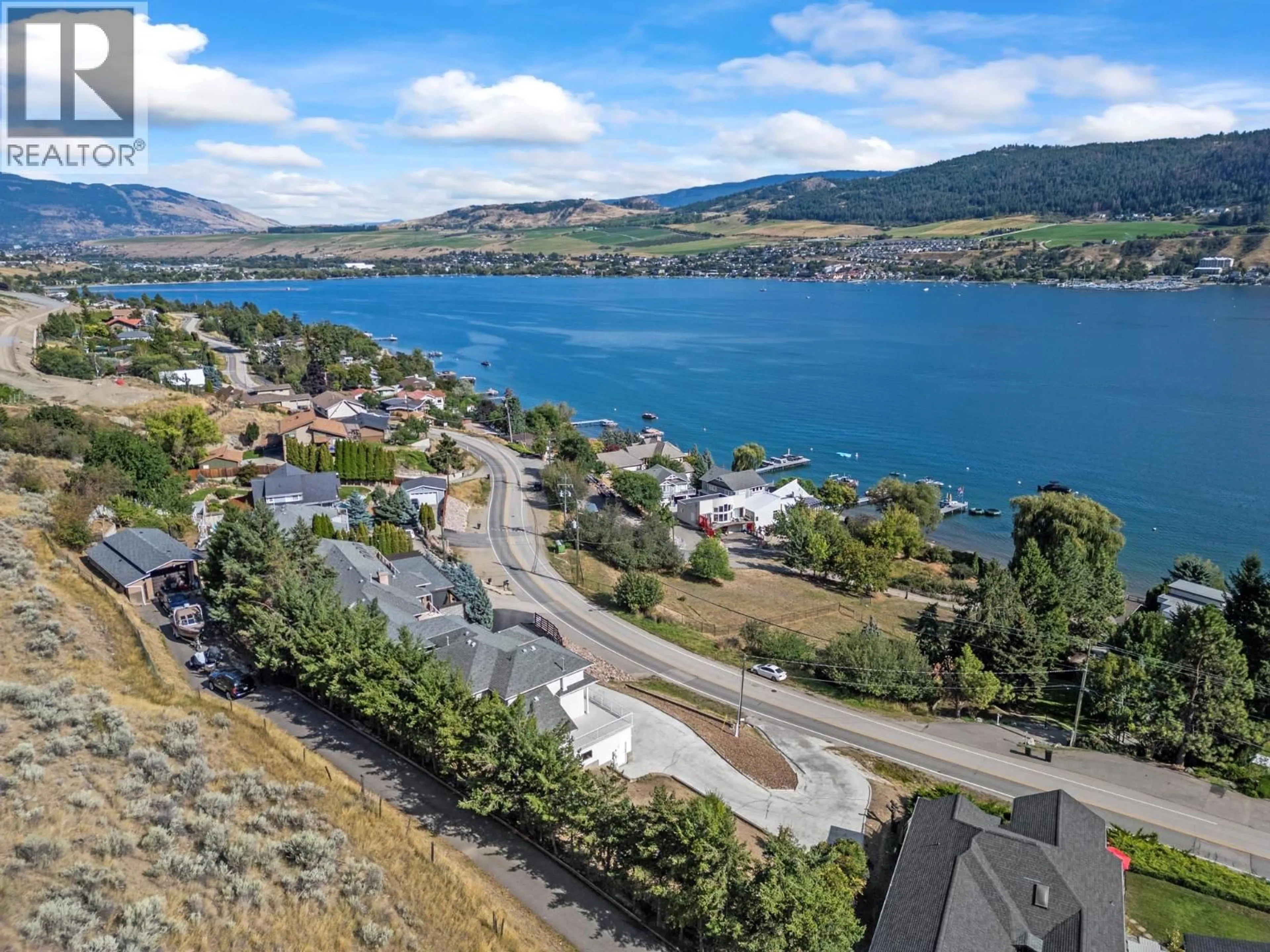A pic from outside/outdoor area/front of a property/back of a property/a pic from drone, water/lake/river/ocean view for 7967 TRONSON ROAD, Vernon British Columbia V1H1C6