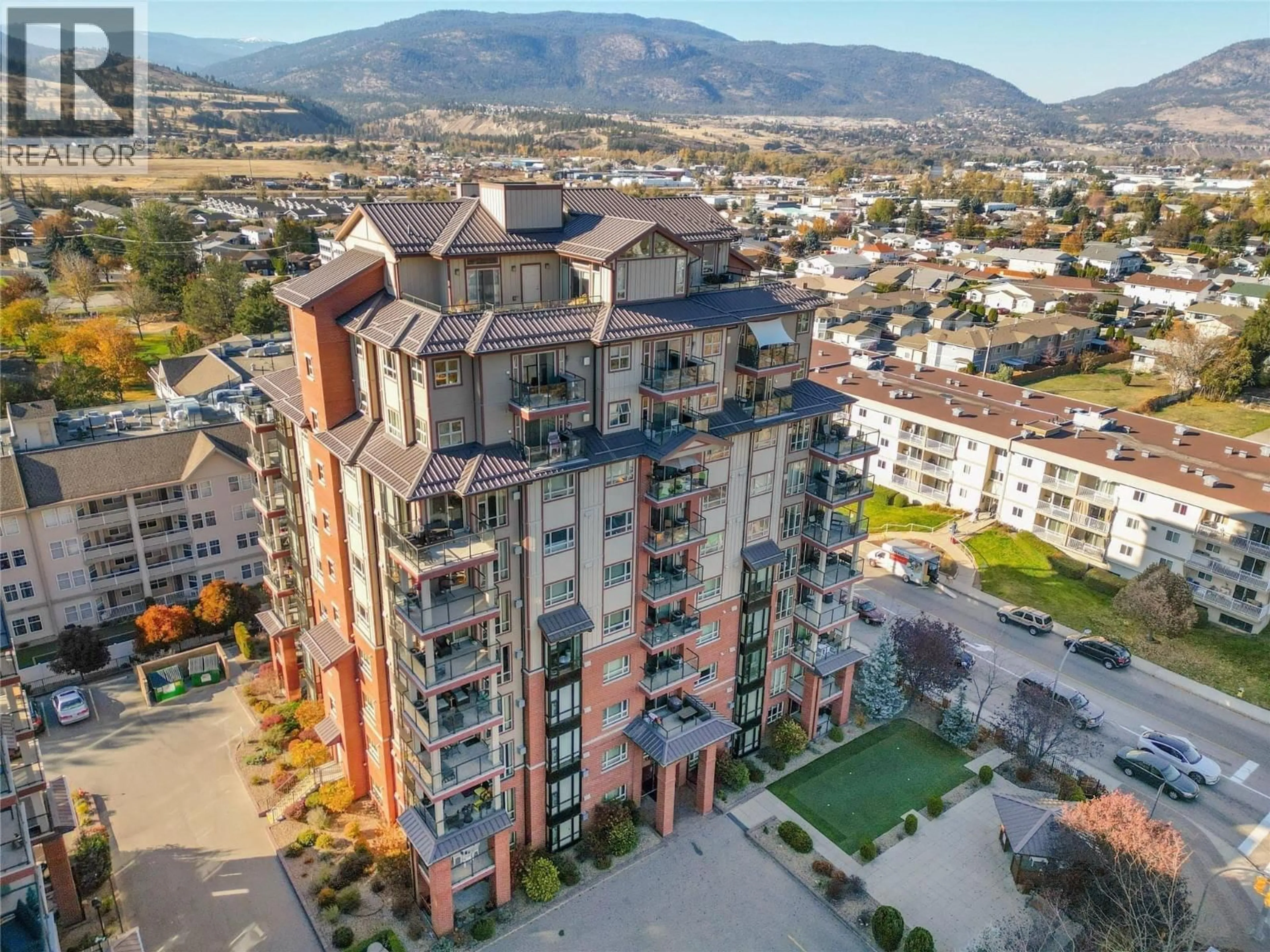 A pic from outside/outdoor area/front of a property/back of a property/a pic from drone, city buildings view from balcony for 506 - 2113 ATKINSON STREET, Penticton British Columbia V2A8R5