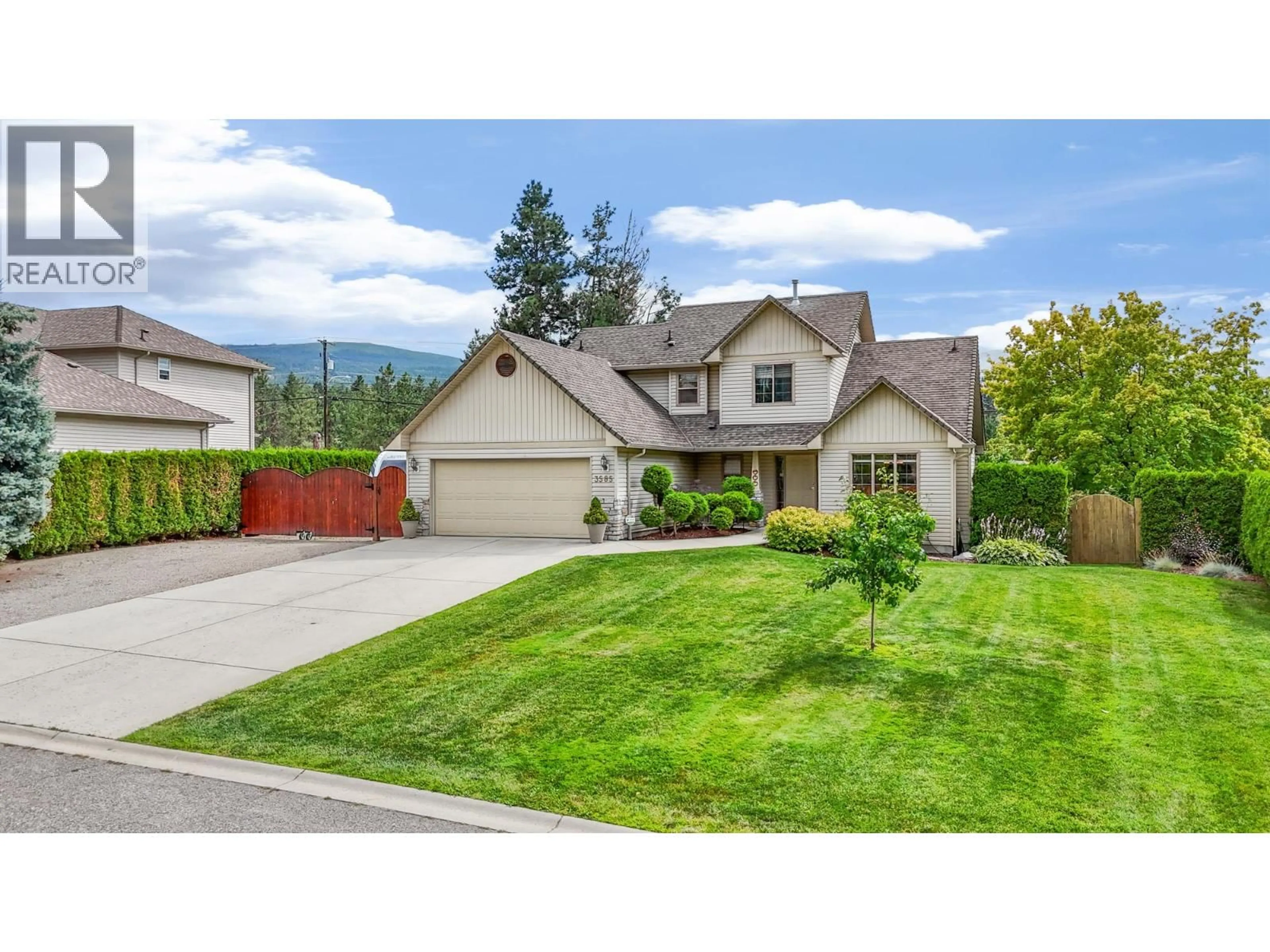 Home with vinyl exterior material, mountain view for 3585 KIMATOUCHE ROAD, Kelowna British Columbia V1Y3G2