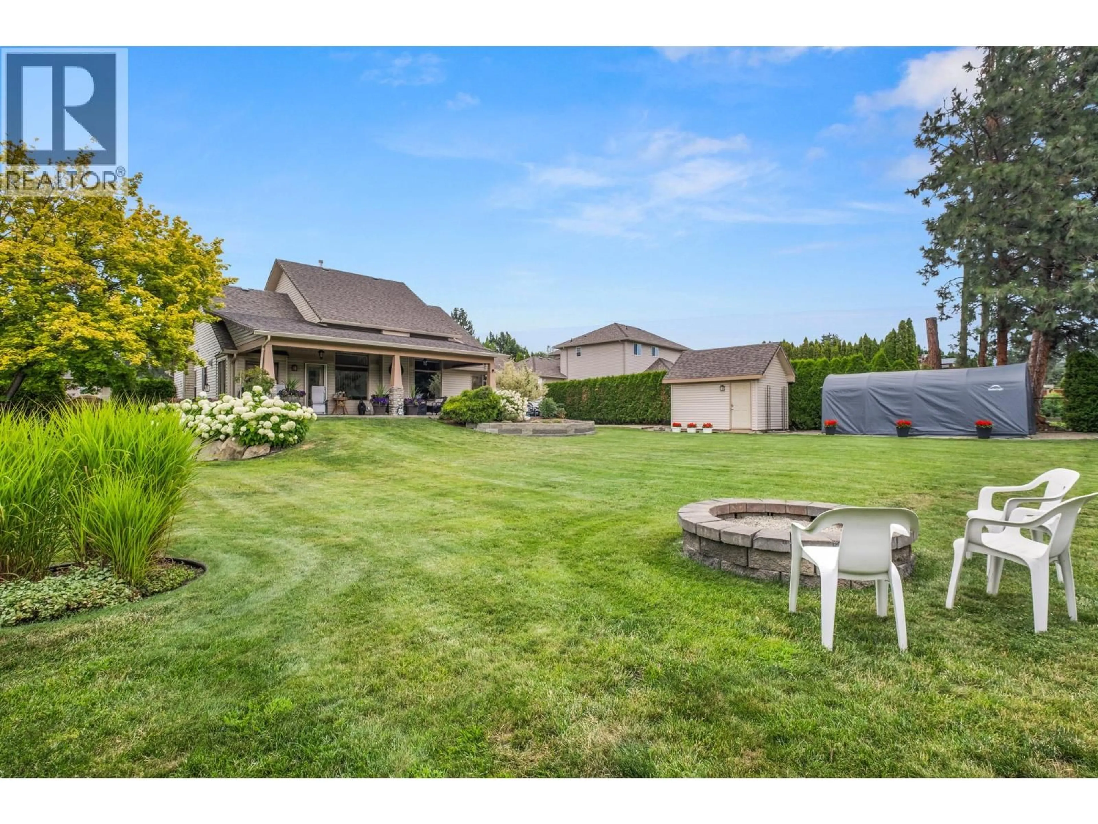 A pic from outside/outdoor area/front of a property/back of a property/a pic from drone, water/lake/river/ocean view for 3585 KIMATOUCHE ROAD, Kelowna British Columbia V1Y3G2