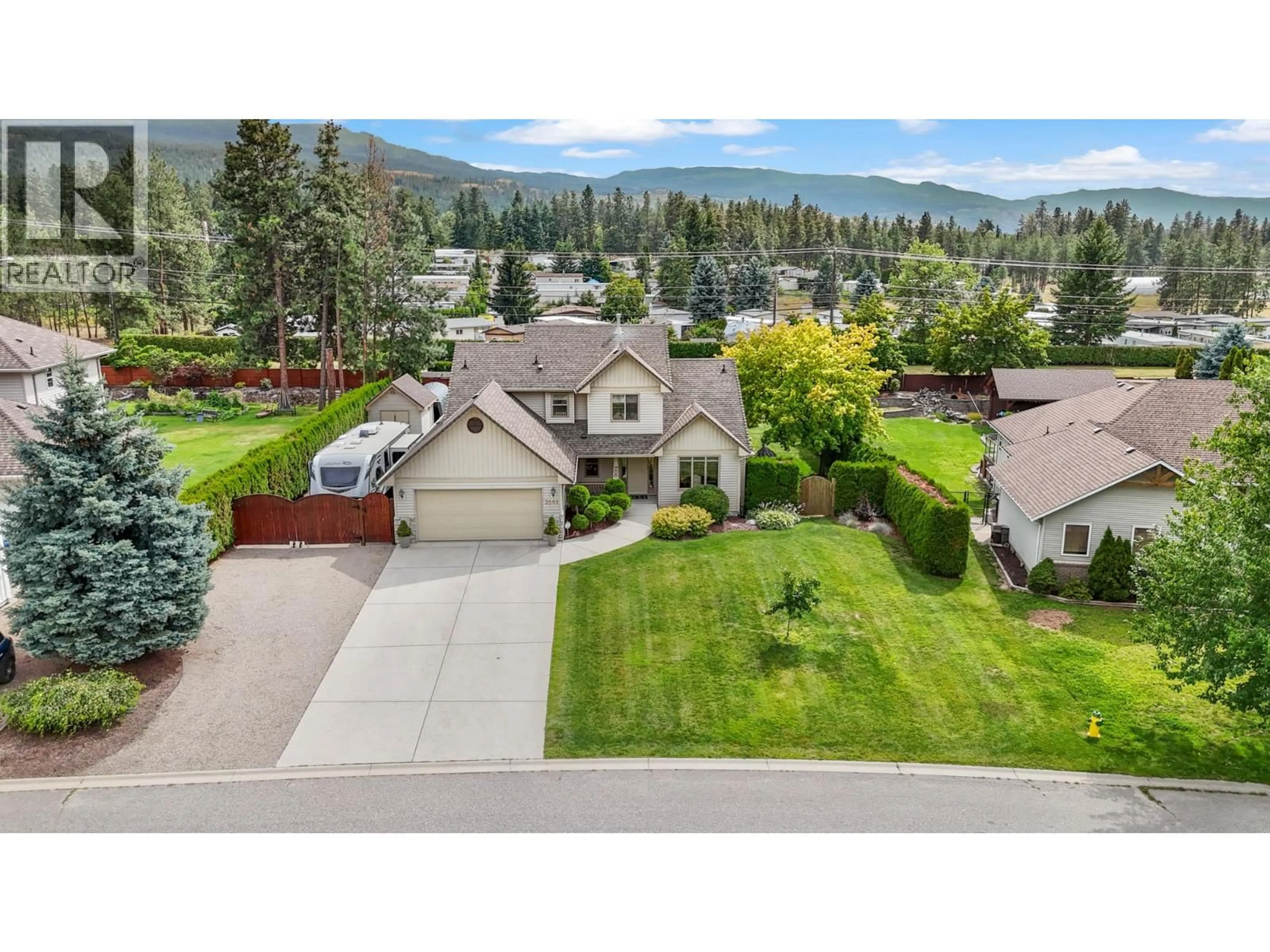 A pic from outside/outdoor area/front of a property/back of a property/a pic from drone, mountain view for 3585 KIMATOUCHE ROAD, Kelowna British Columbia V1Y3G2