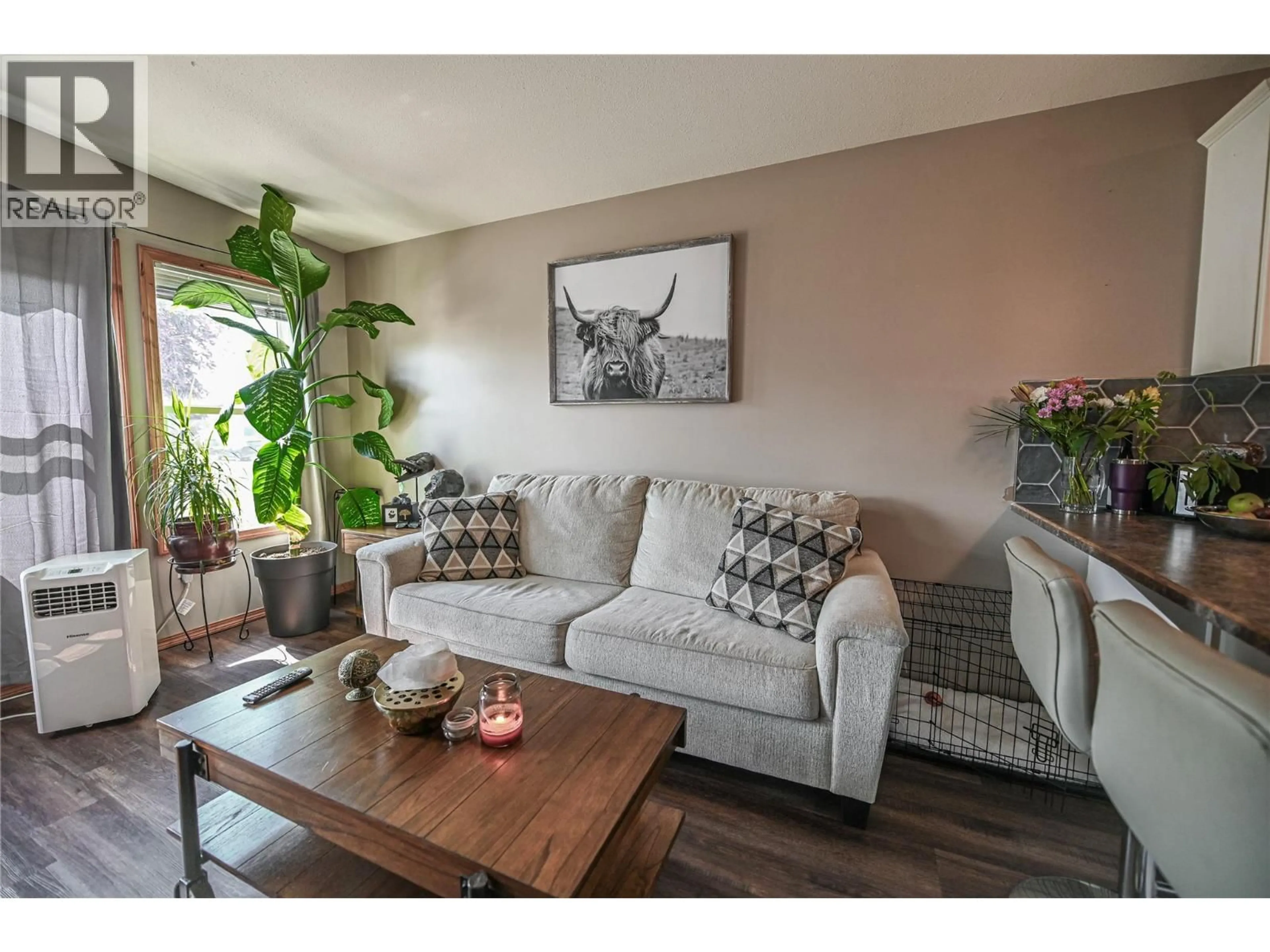 Living room with furniture, wood/laminate floor for 4867 BURNS AVENUE, Canal Flats British Columbia V0B1B0