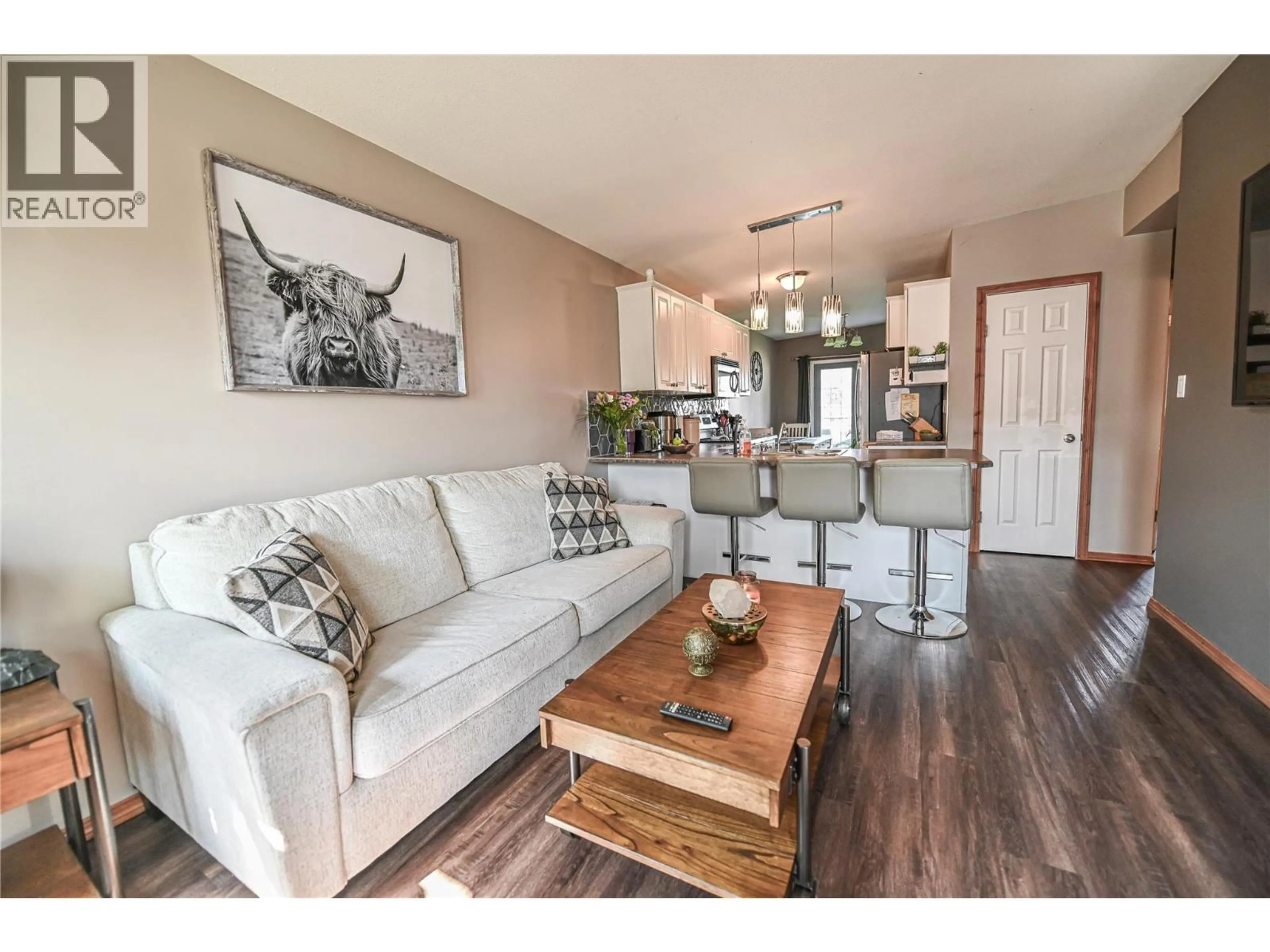 Living room with furniture, wood/laminate floor for 4867 BURNS AVENUE, Canal Flats British Columbia V0B1B0