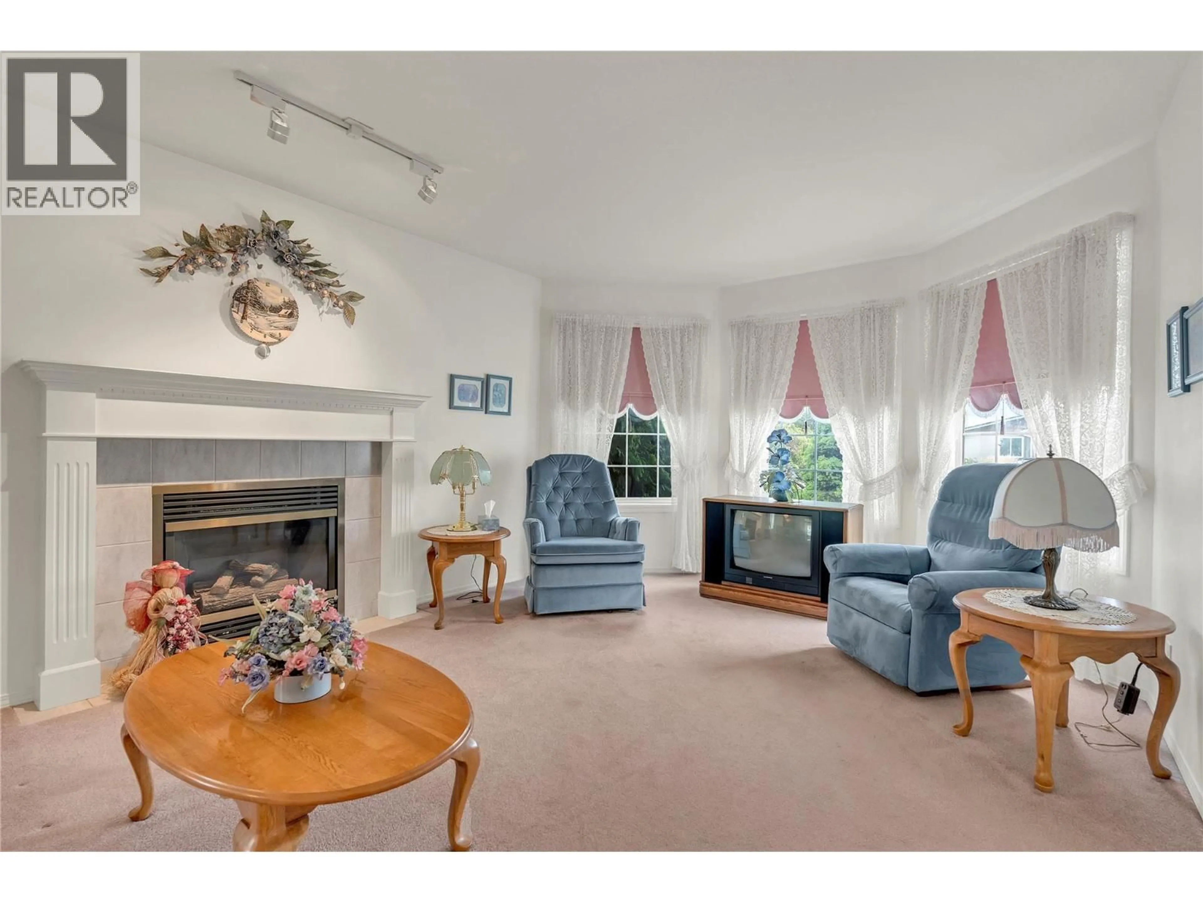 Living room with furniture, unknown for 13208 ARMSTRONG AVENUE, Summerland British Columbia V0H1Z0