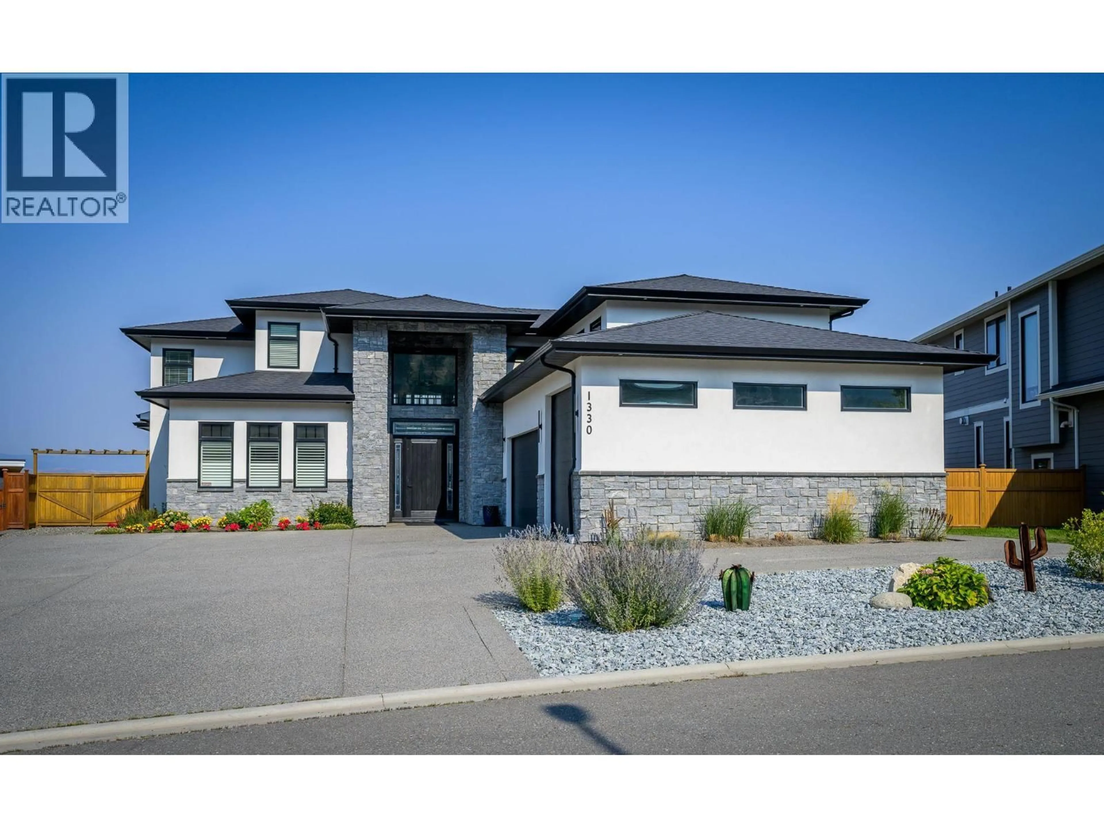 Home with vinyl exterior material, street for 1330 MYRA PLACE, Kamloops British Columbia V2E0C3