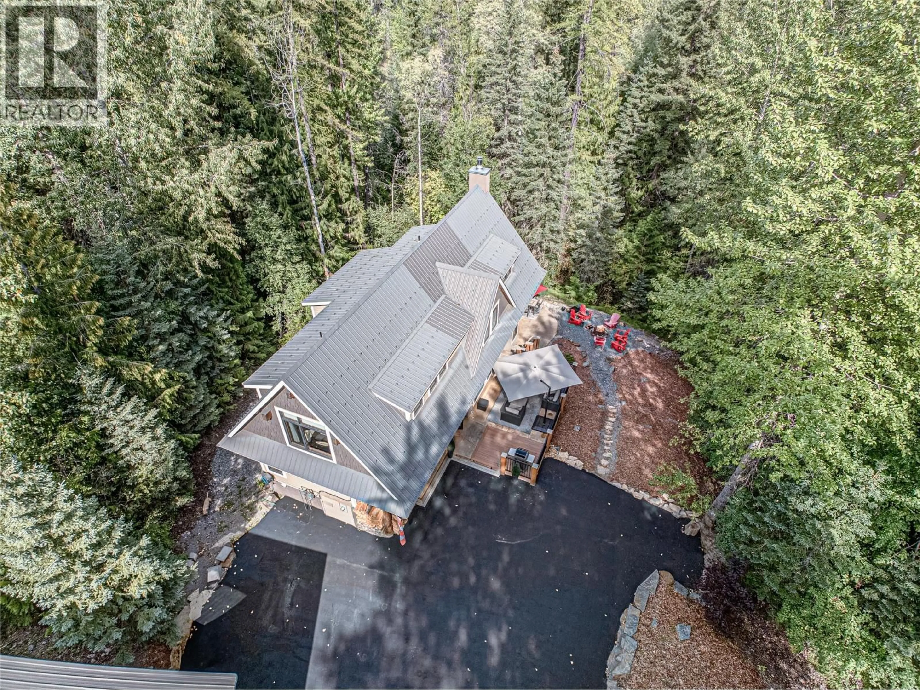 A pic from outside/outdoor area/front of a property/back of a property/a pic from drone, forest/trees view for 350 CANYON TRAIL OTHER, Fernie British Columbia V0B1M6