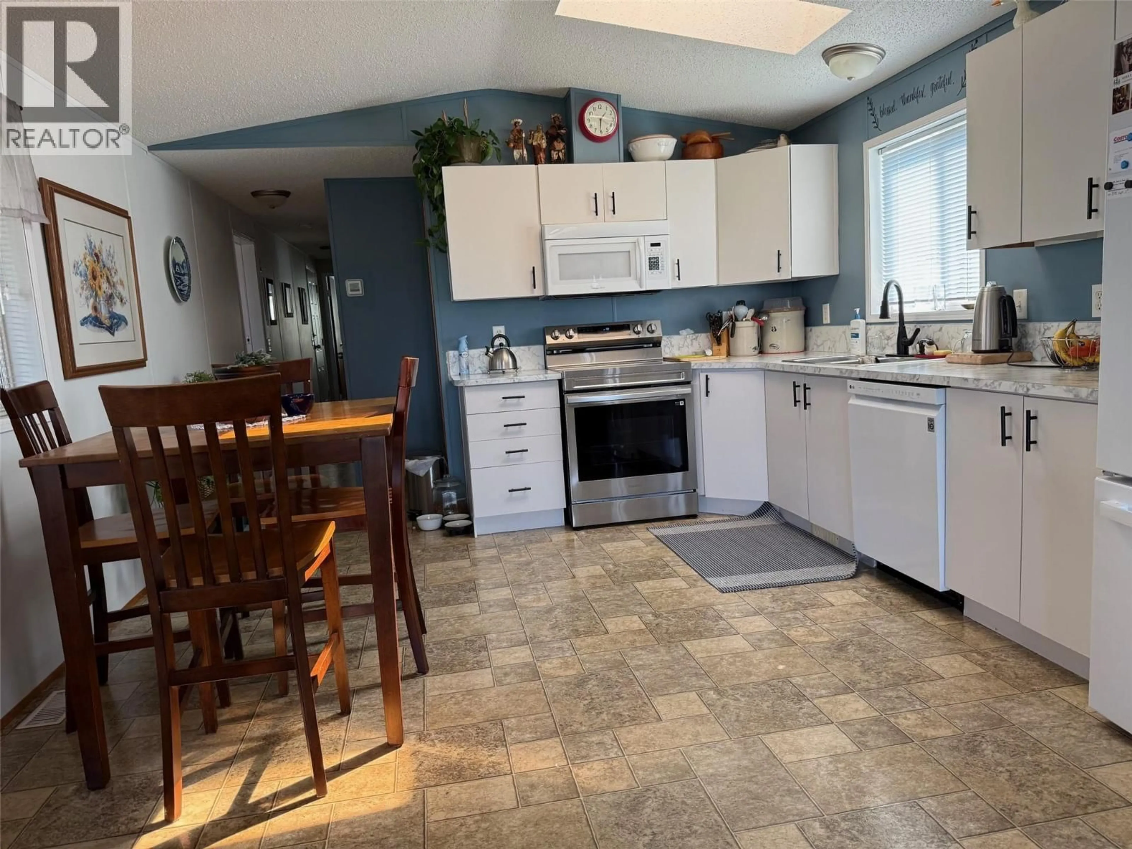 Open concept kitchen, ceramic/tile floor for 24 - 4510 POWER ROAD, Barriere British Columbia V0E1E0