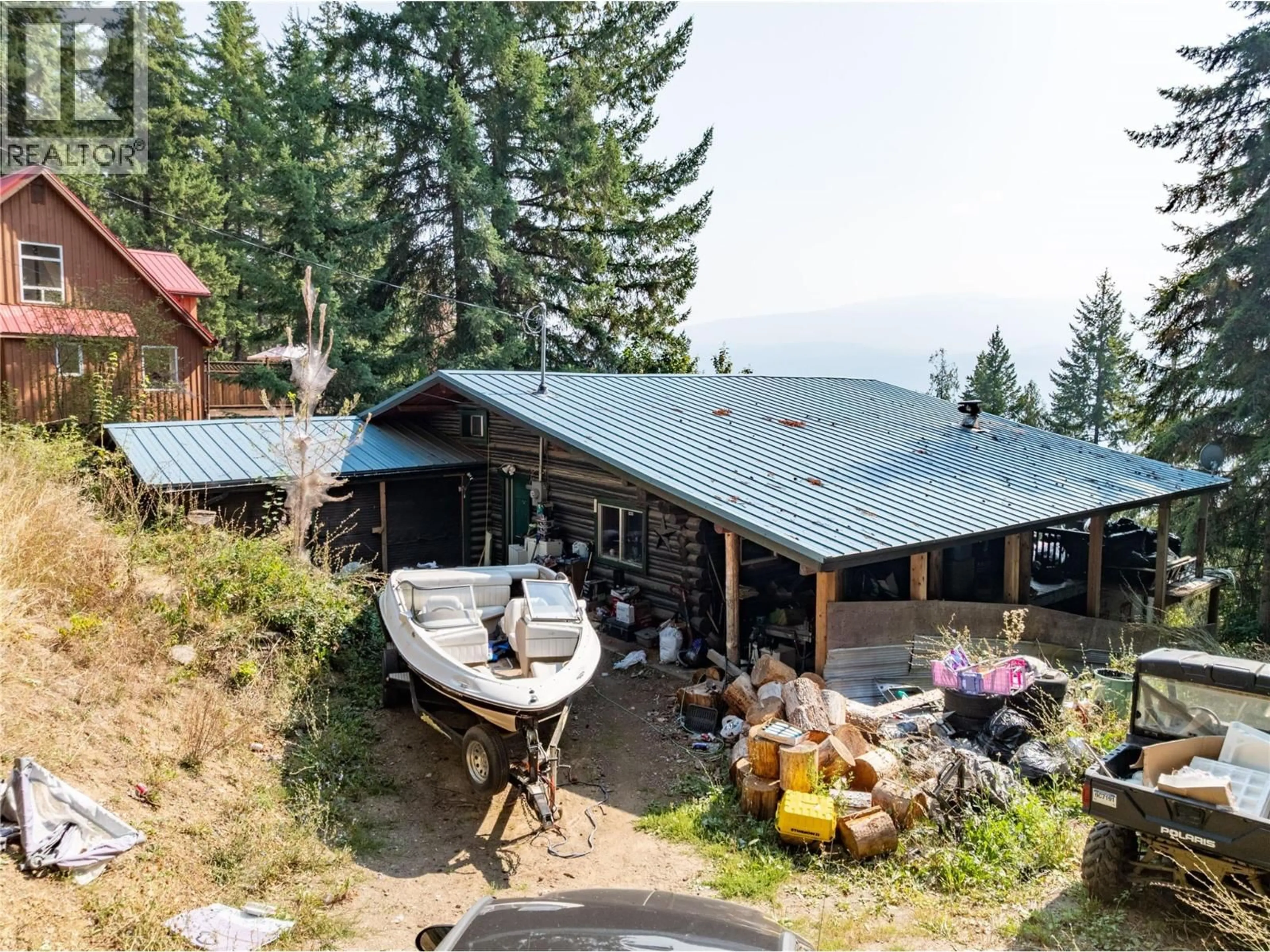 A pic from outside/outdoor area/front of a property/back of a property/a pic from drone, mountain view for 7578 STAMPEDE TRAIL, Anglemont British Columbia V0E1M8