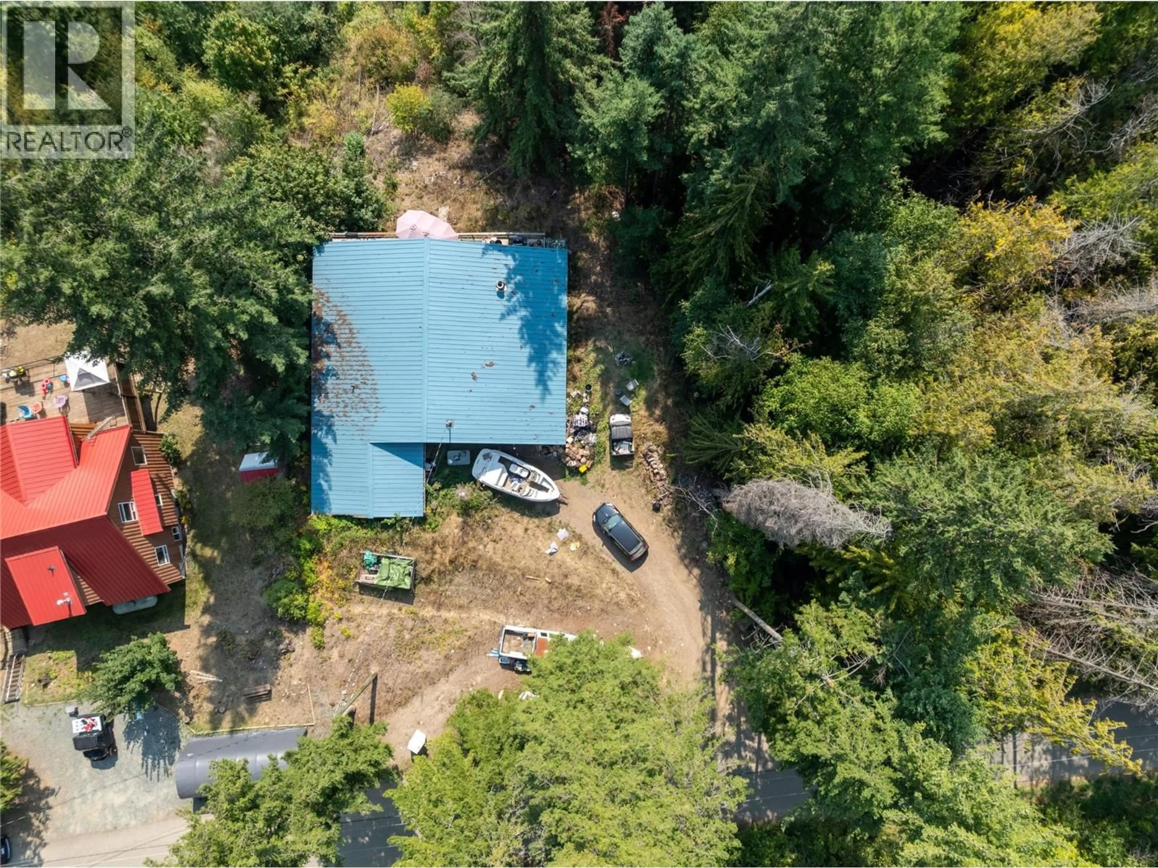 A pic from outside/outdoor area/front of a property/back of a property/a pic from drone, forest/trees view for 7578 STAMPEDE TRAIL, Anglemont British Columbia V0E1M8