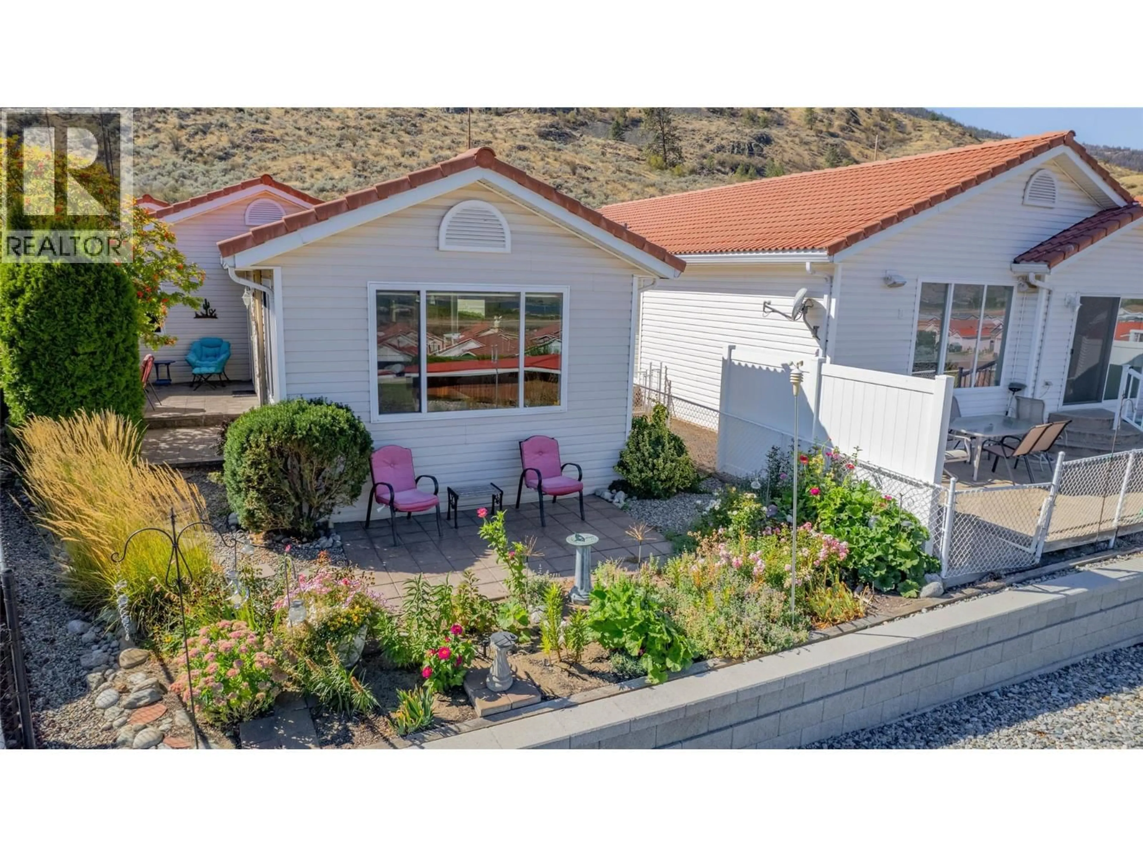 A pic from outside/outdoor area/front of a property/back of a property/a pic from drone, street for 48 - 9400 115TH STREET, Osoyoos British Columbia V0H1V5