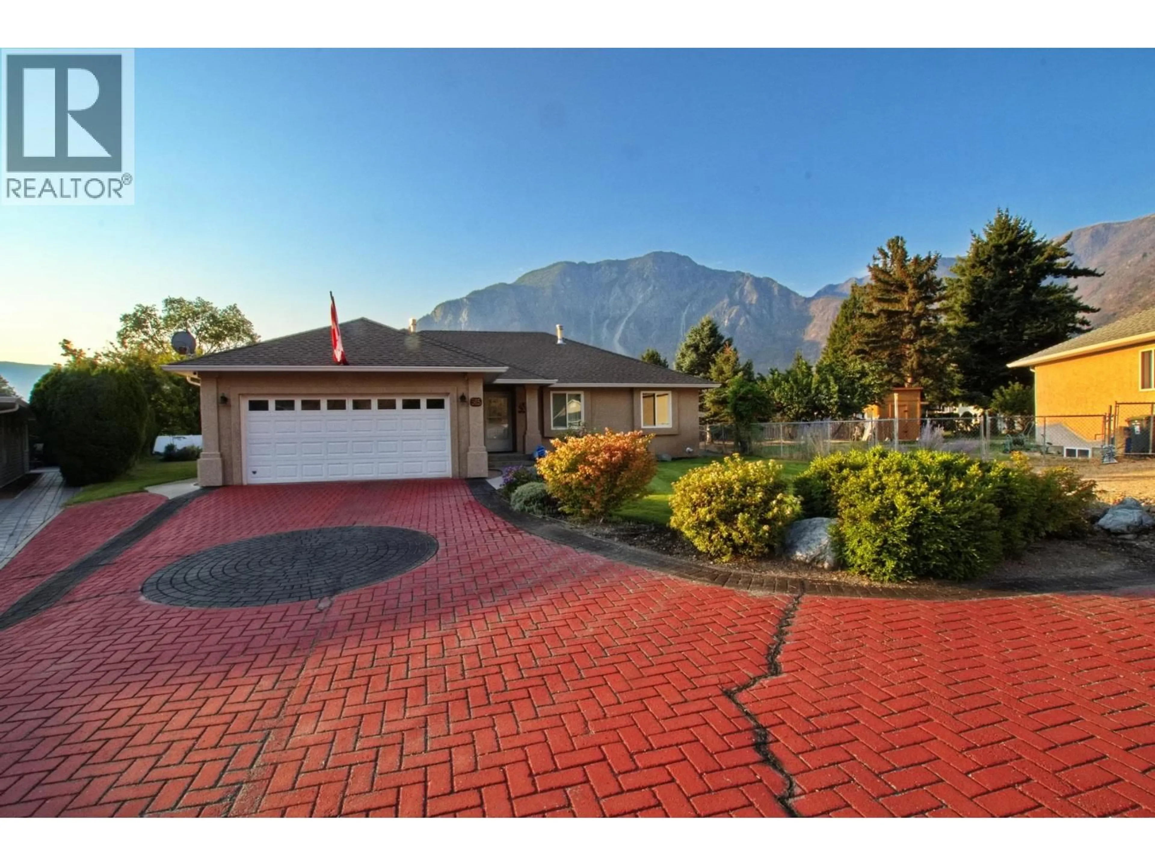 A pic from outside/outdoor area/front of a property/back of a property/a pic from drone, mountain view for 515 VANDERLINDE DRIVE, Keremeos British Columbia V0X1N2