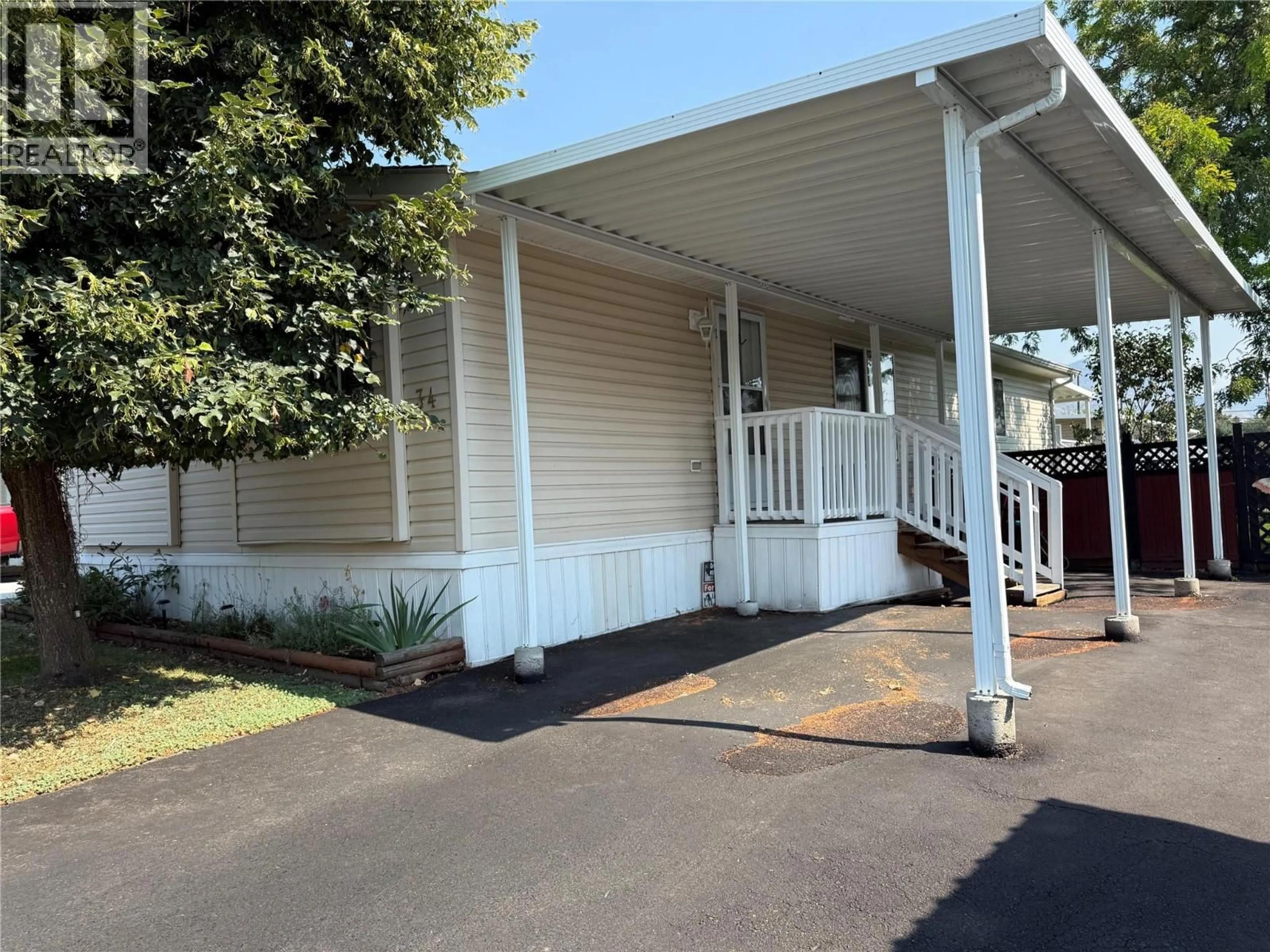 Home with vinyl exterior material, street for 34 - 7225 BOUNDARY DRIVE, Grand Forks British Columbia V0H1H0